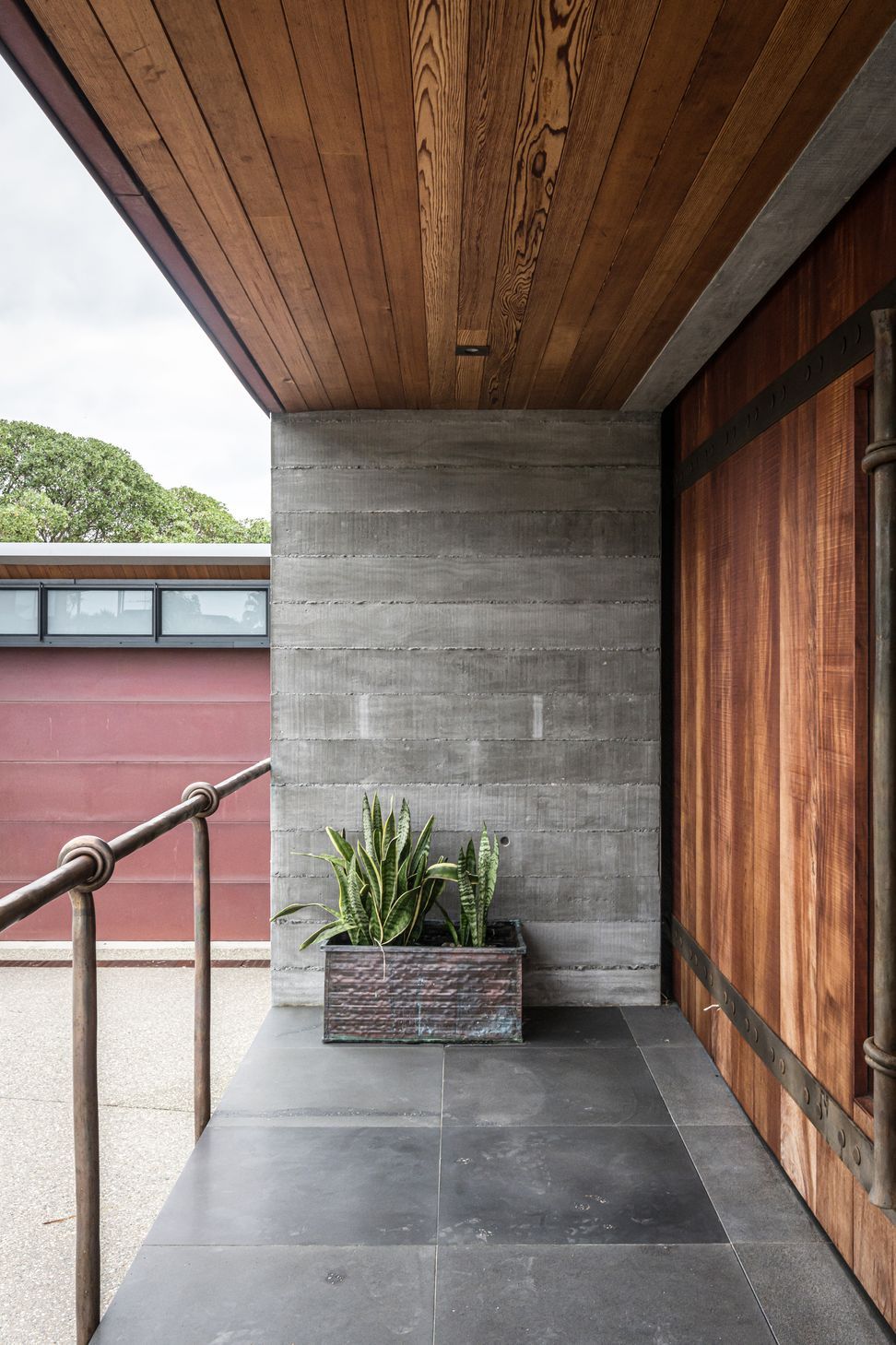 Enter through a huge timber barn door with handcrafted metal hardware.