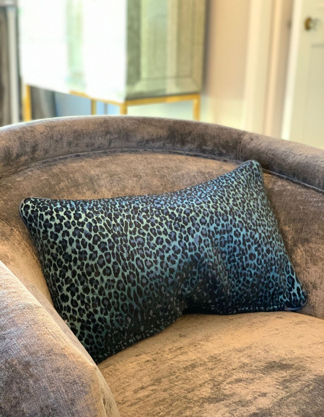Leopard skin in shades of blue with leather trim
