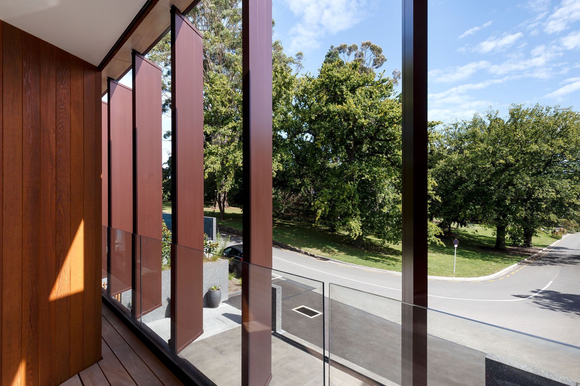  The fixed aluminium louvres provide screening for sun and privacy, and direct views towards the open space greenery