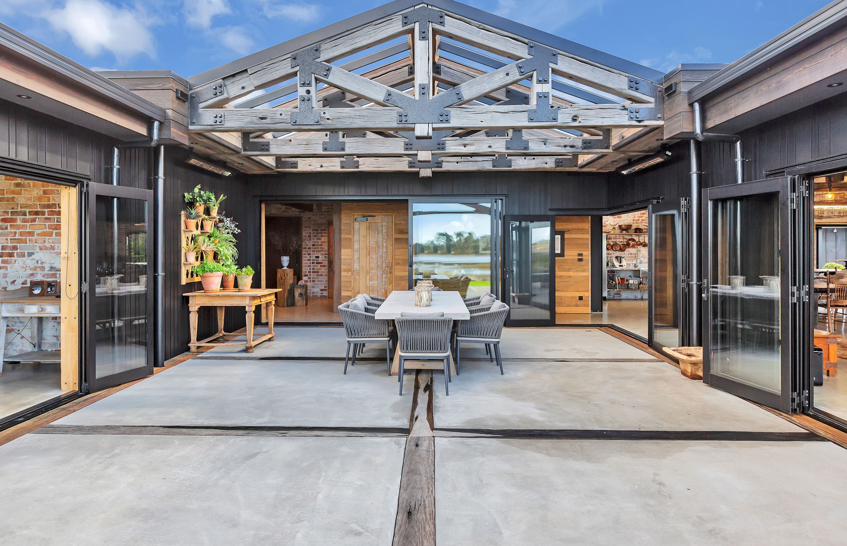 The house wraps around the courtyard, which can be accessed from all sides.