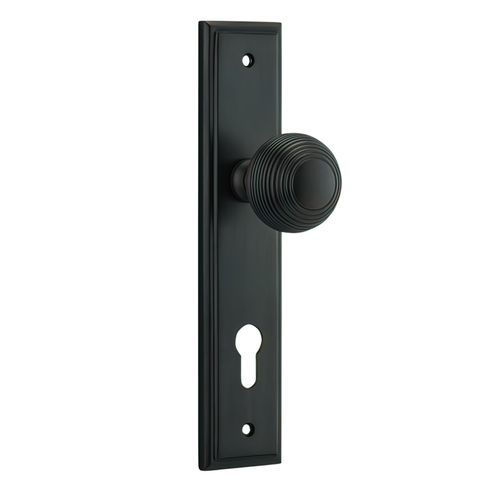 Iver Guildford Door Knob on Stepped Backplate Signature Brass