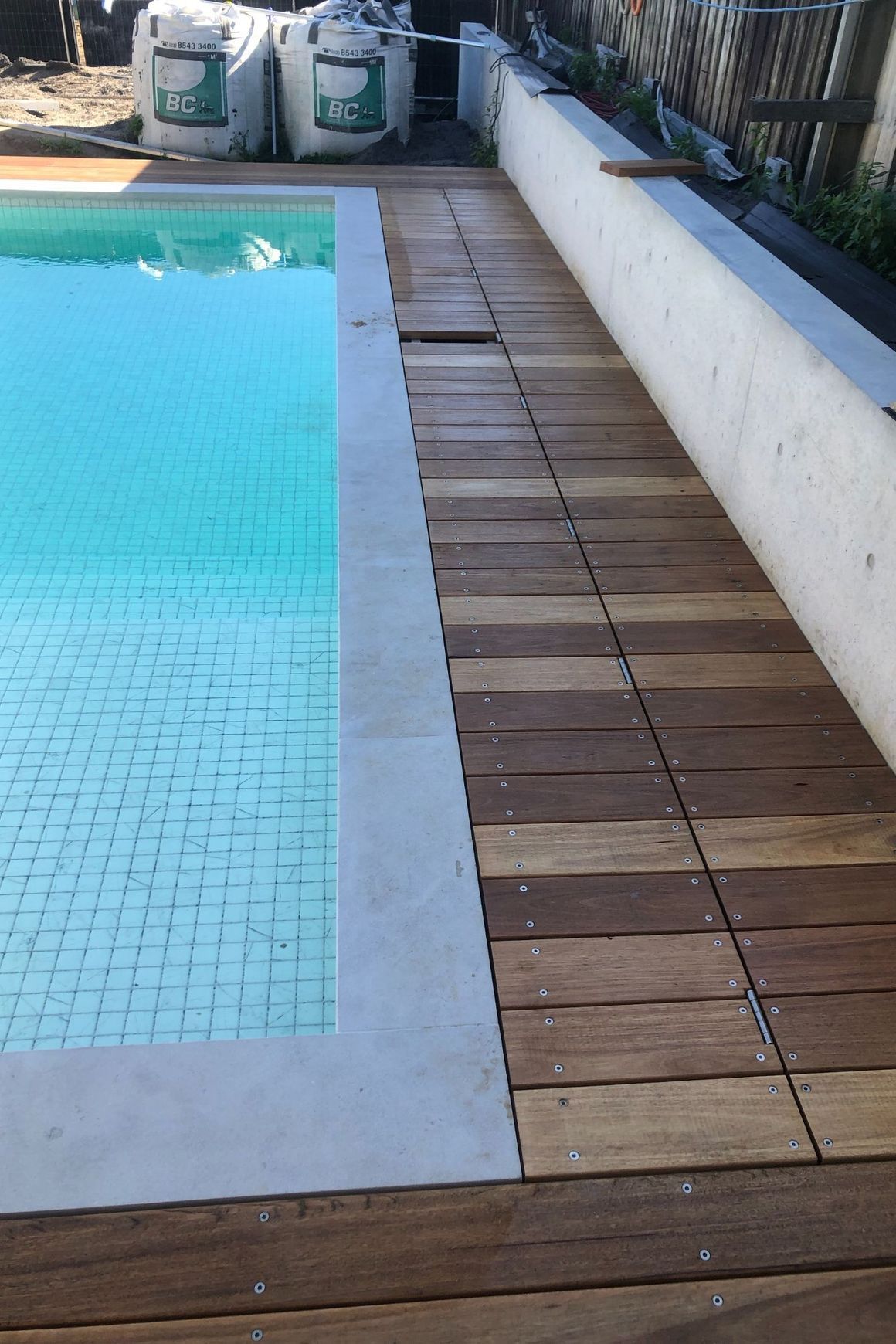 Under Deck UnderCover® Concealed Pool Cover - Powered