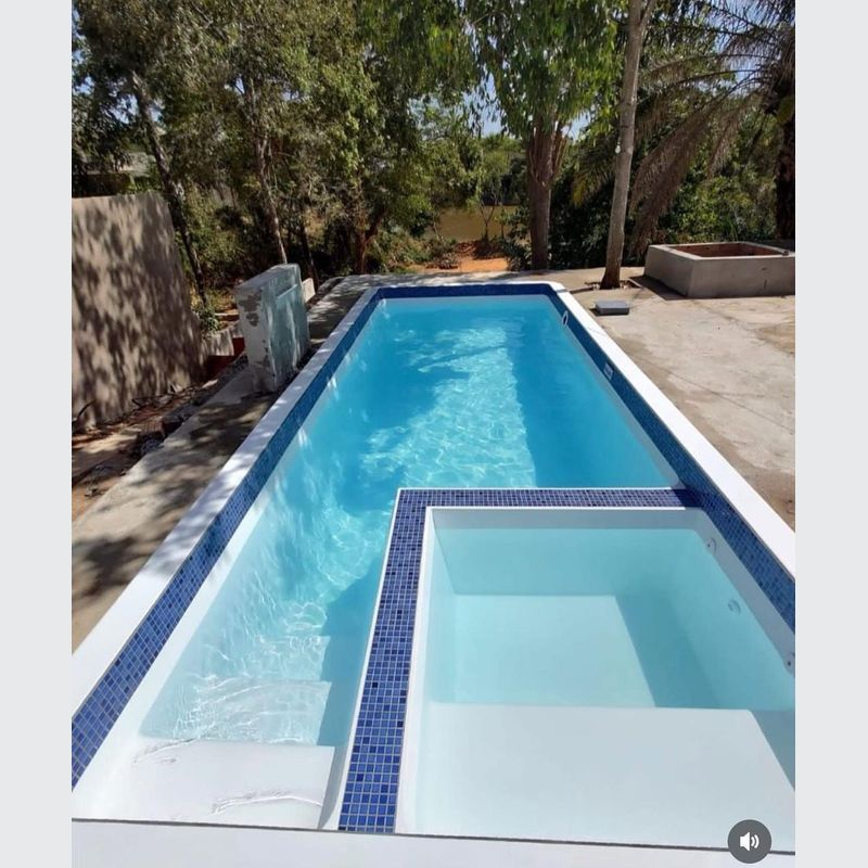 Tile Lined Swimming Pool with built-in spa included