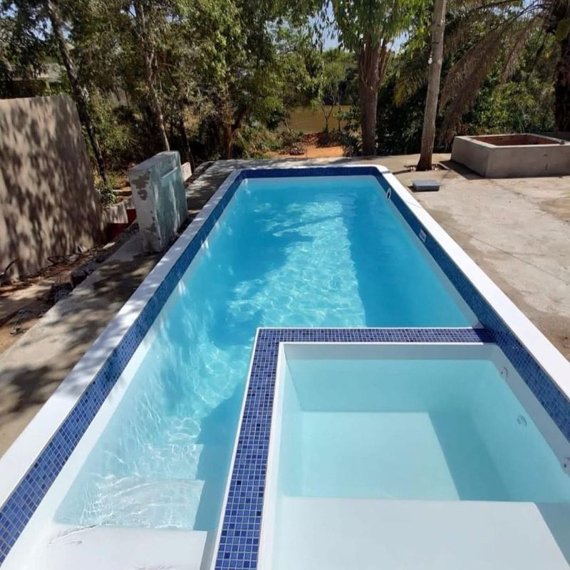 Tile Lined Swimming Pool with built-in spa included