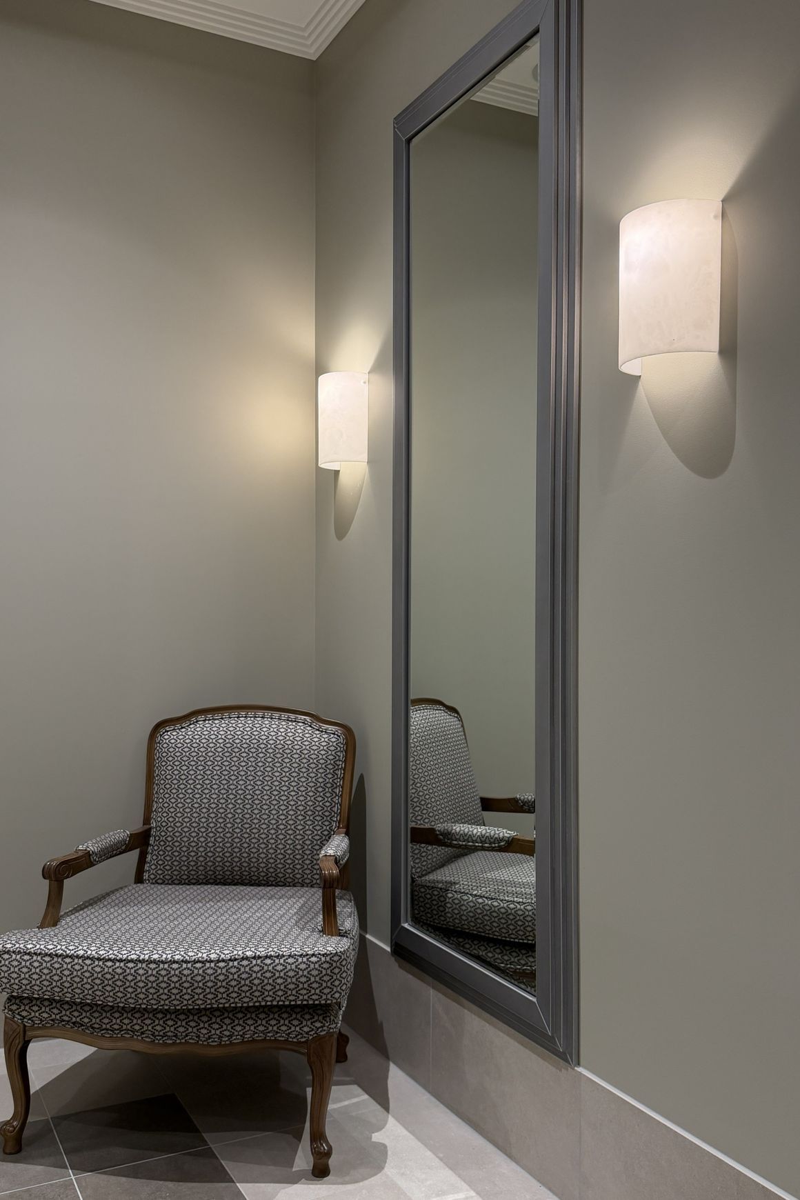 Alabaster 1 Light Curved Wall Light in Faux White