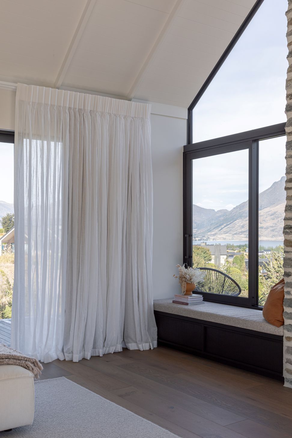 The window seat overlooks Lake Wakatipu