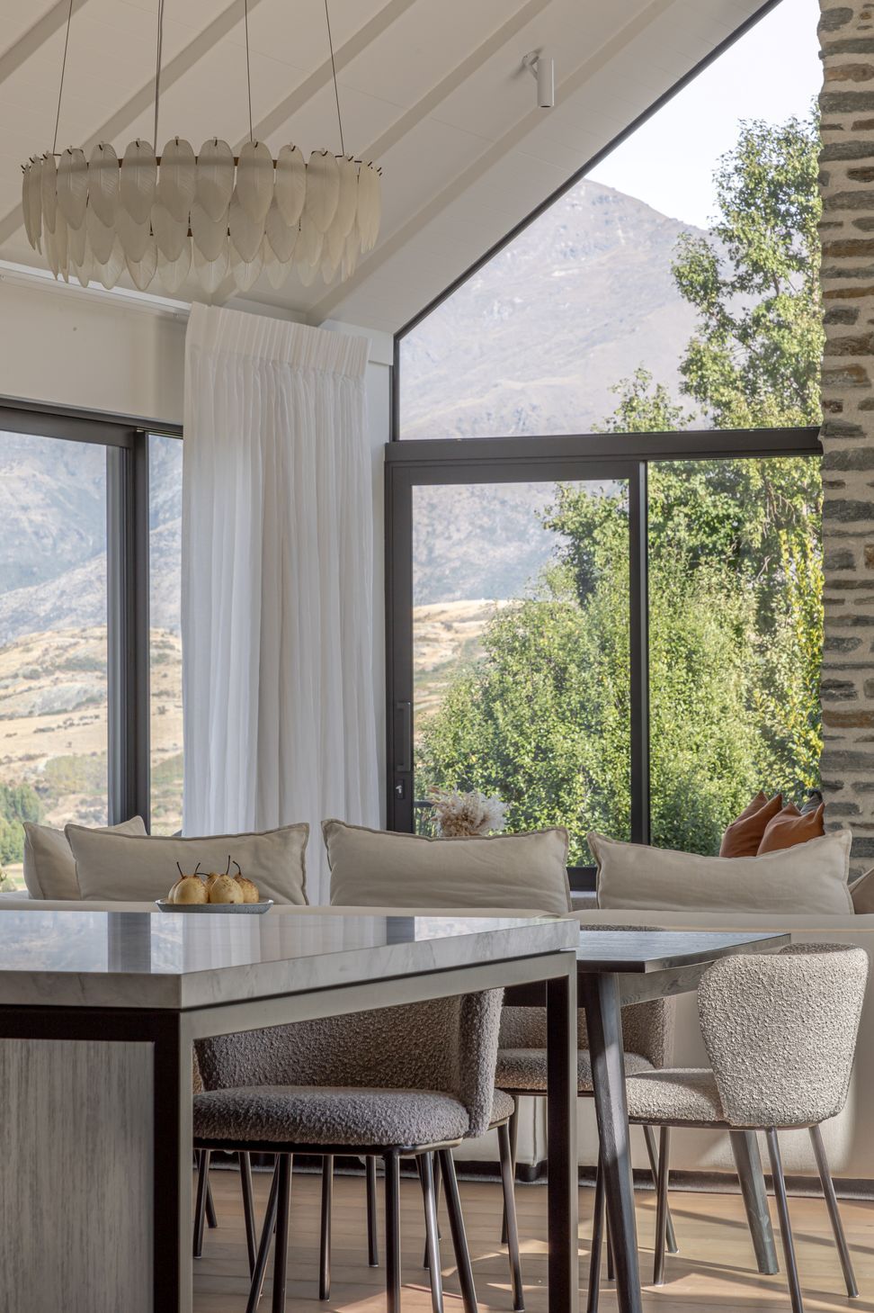 Full height glazing captures the mountain views