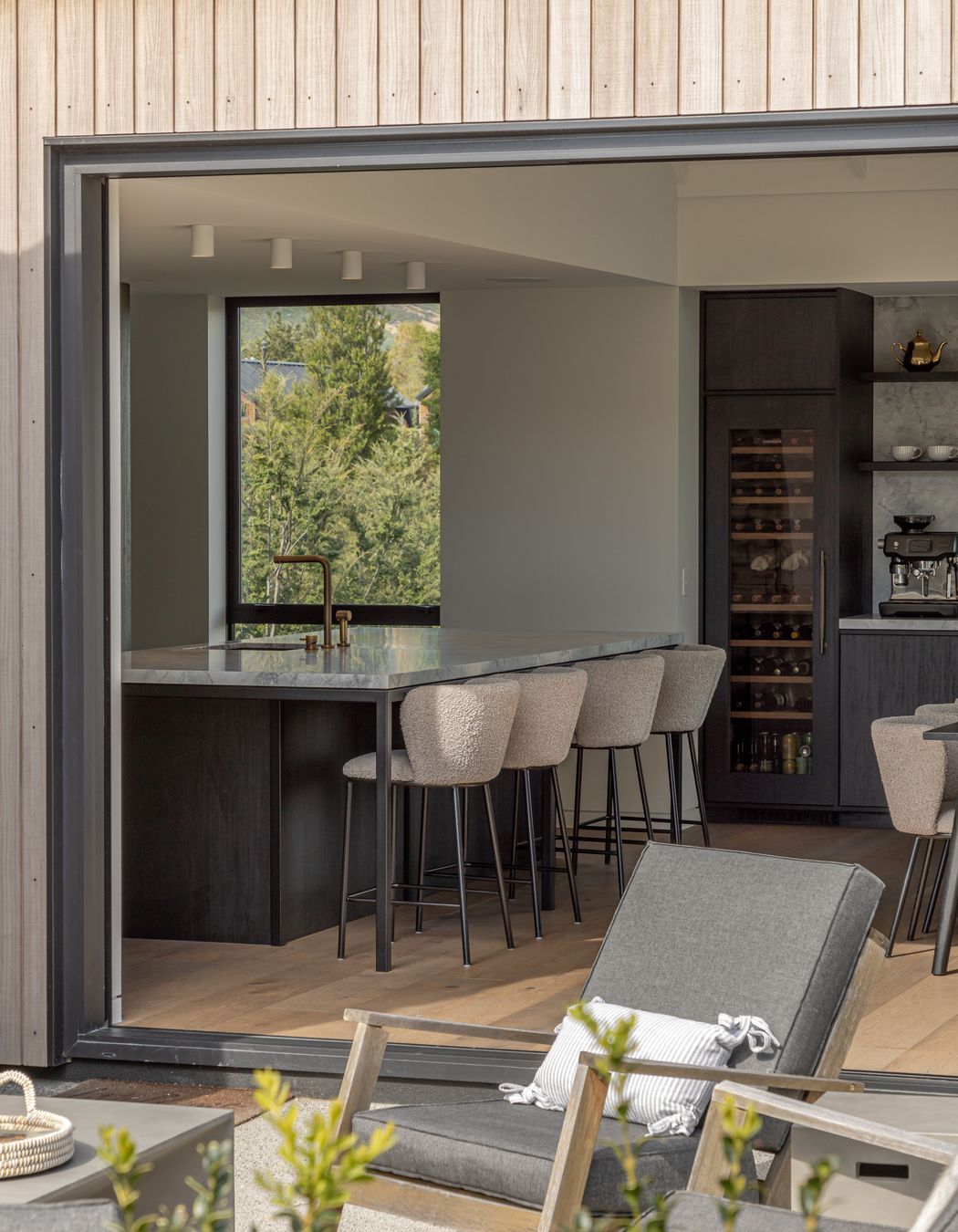 Kitchen and dining open onto a north facing sunny terrace