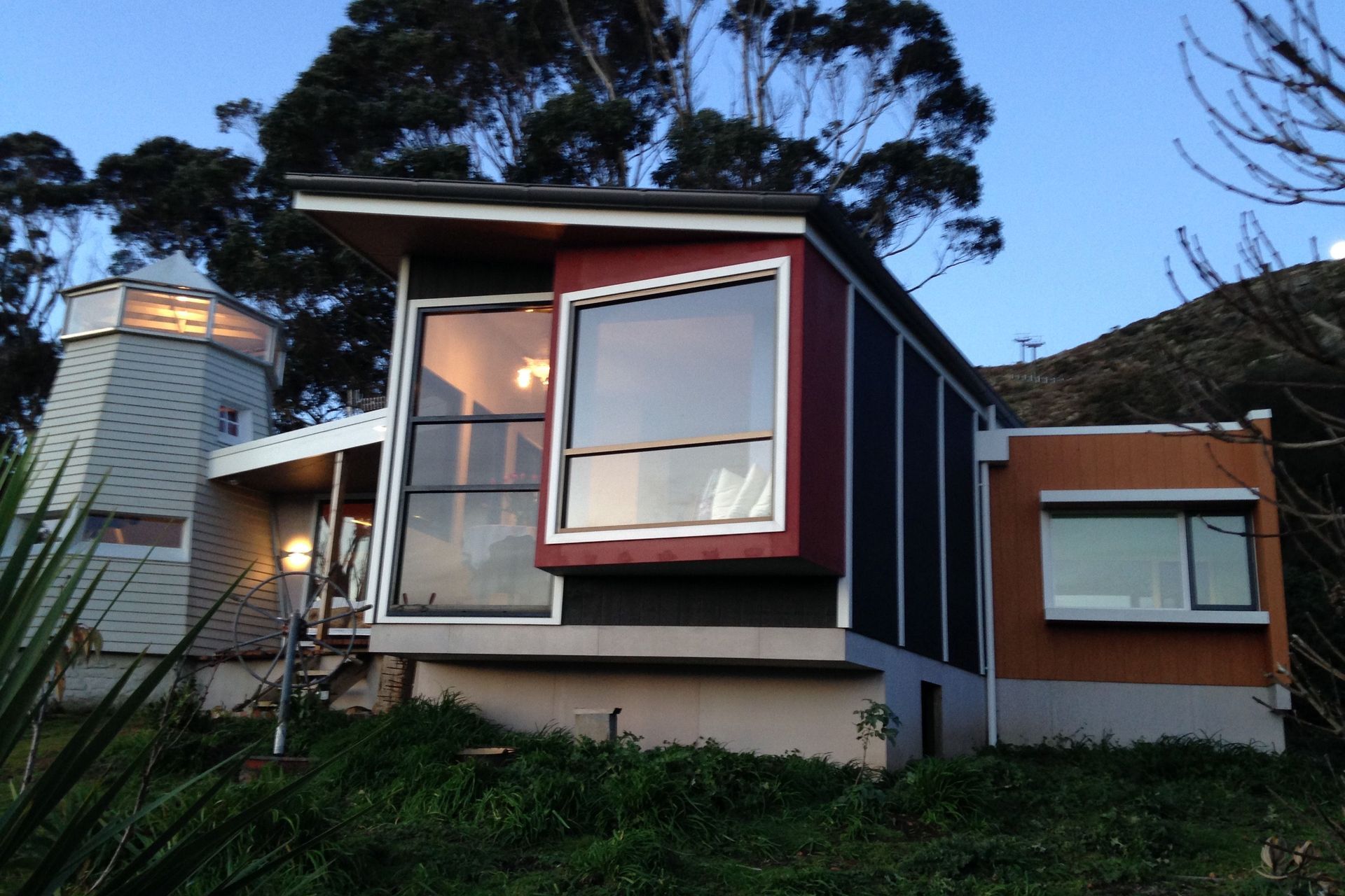Front, northern elevation, inclusive of the original windmill, new verandah, lounge and bed nook