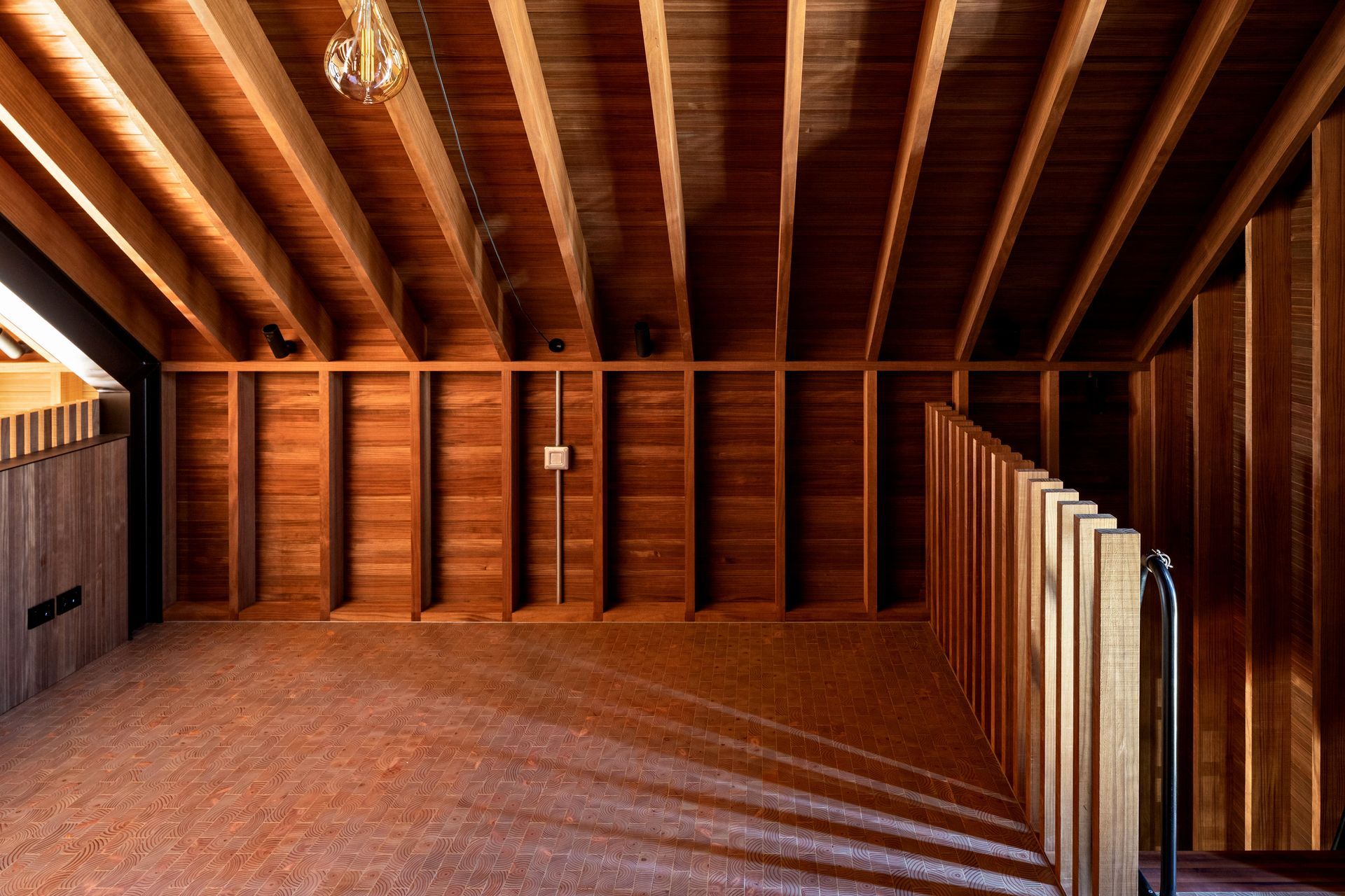 The master bedroom is found in the loft.