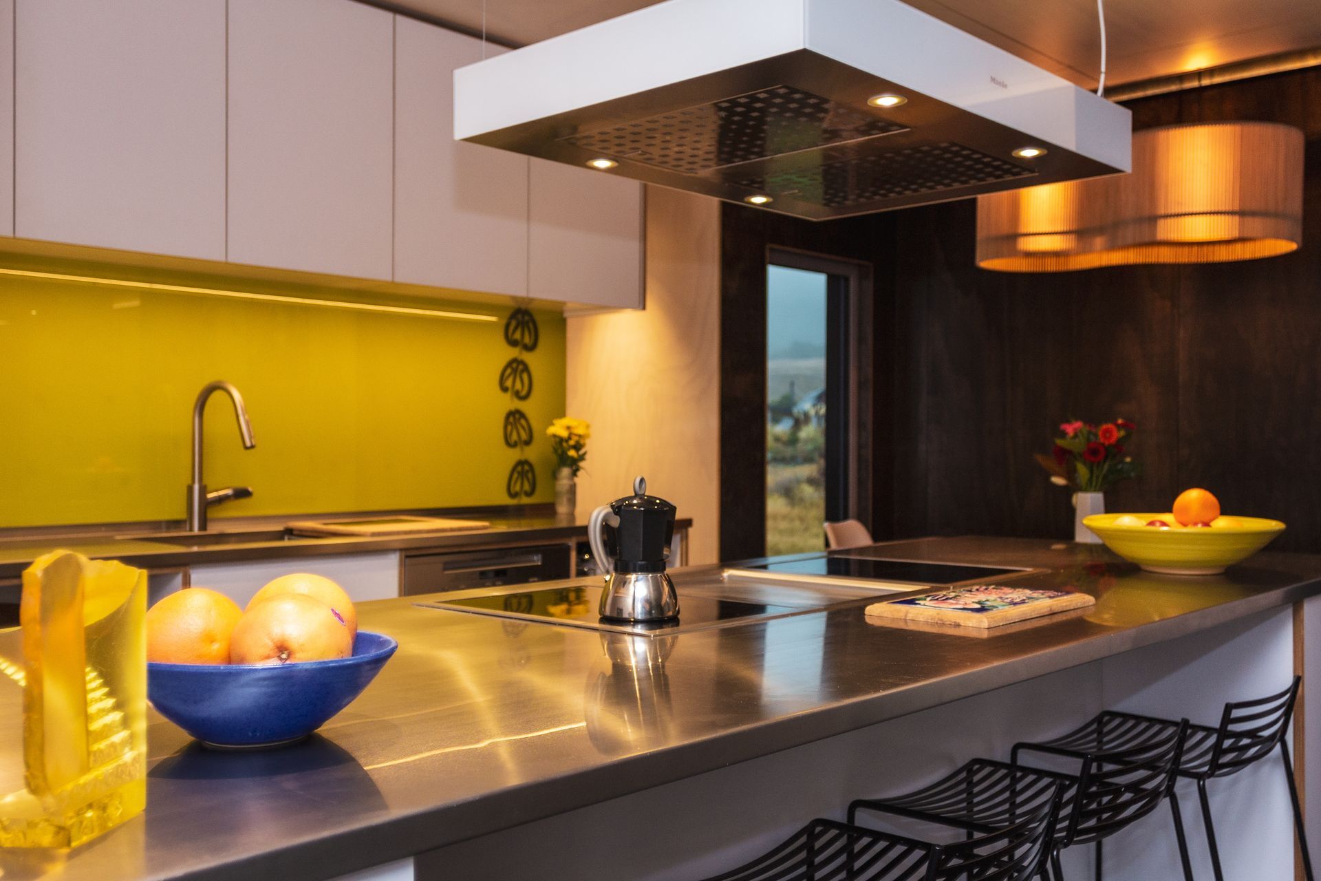 The kitchen splashback tells a personal family story.