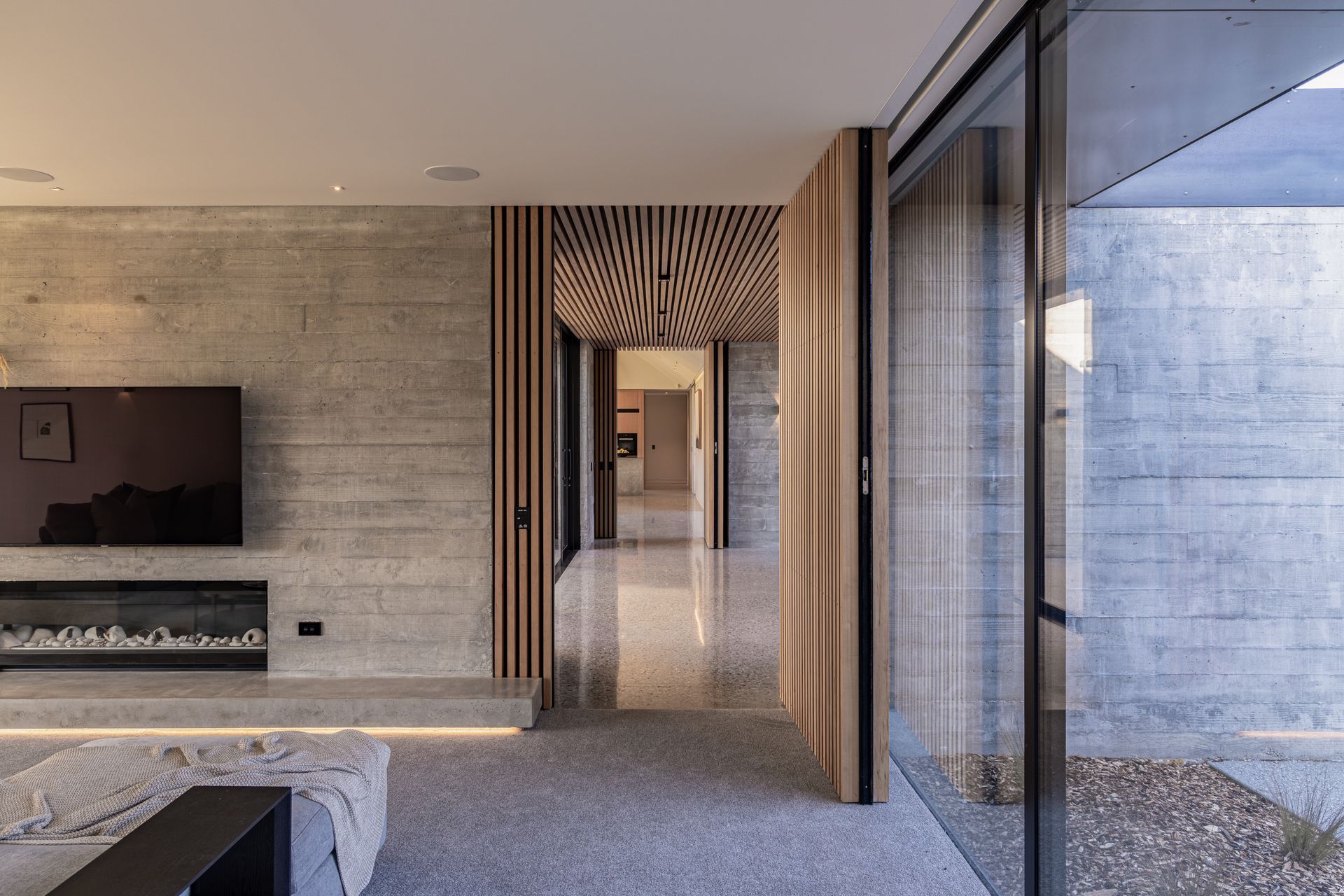 Cedar panels have been used on sections of walls and ceiling.