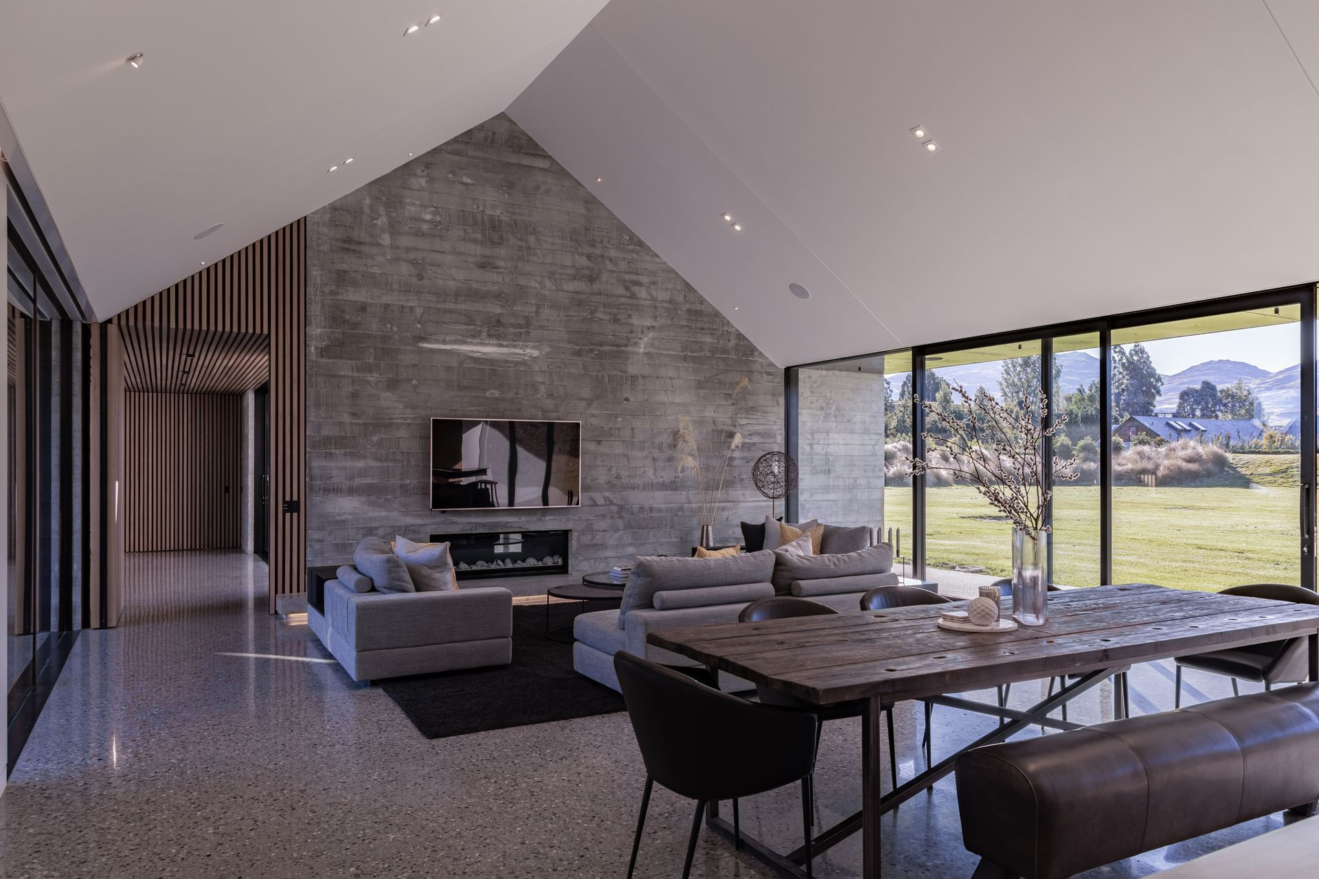 A gabled ceiling in the main living space adds to the home's grandeur.