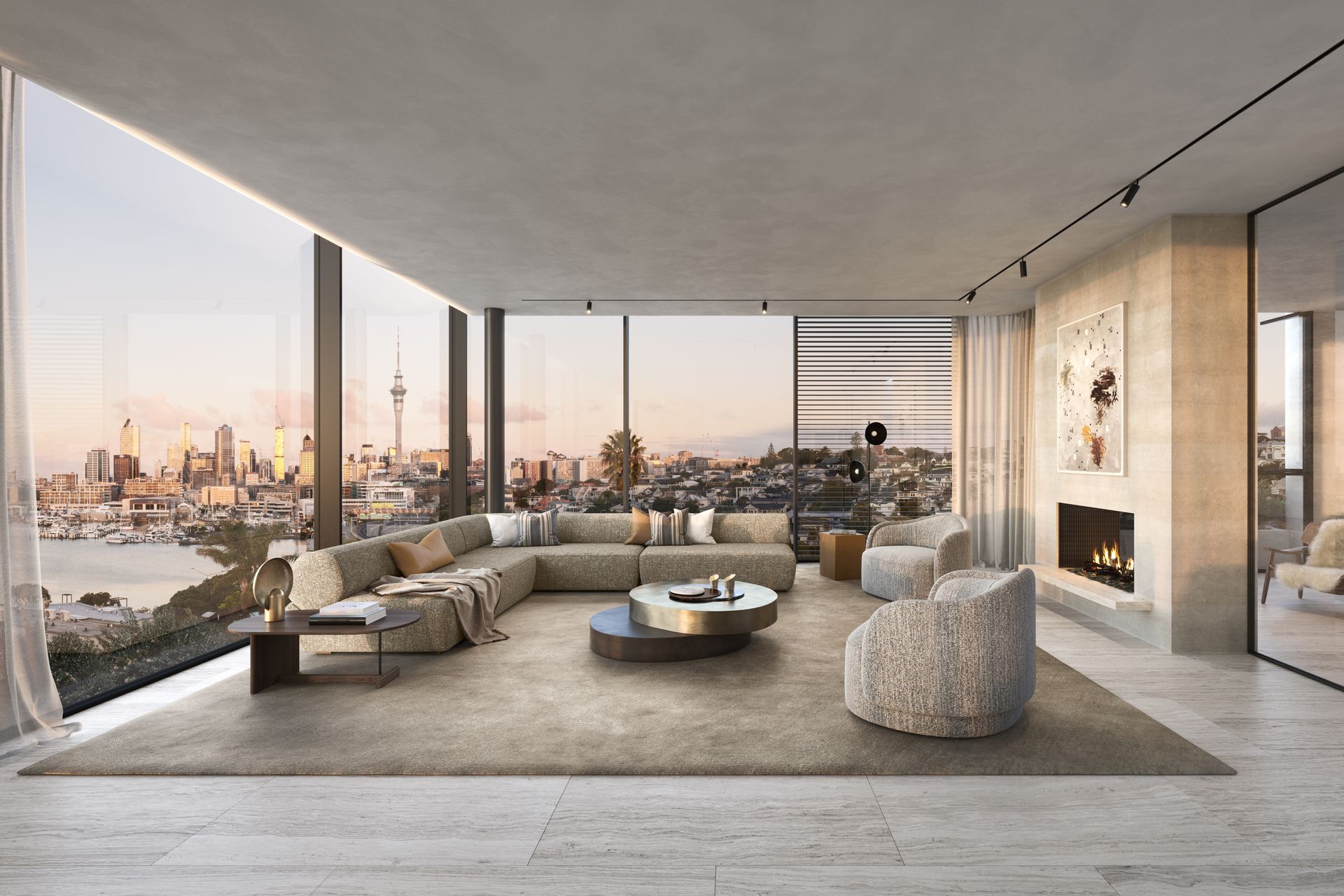 Panoramic views provide a backdrop to stunning open living spaces flanked by feature plastered fireplaces connecting to the adjoining loggia.