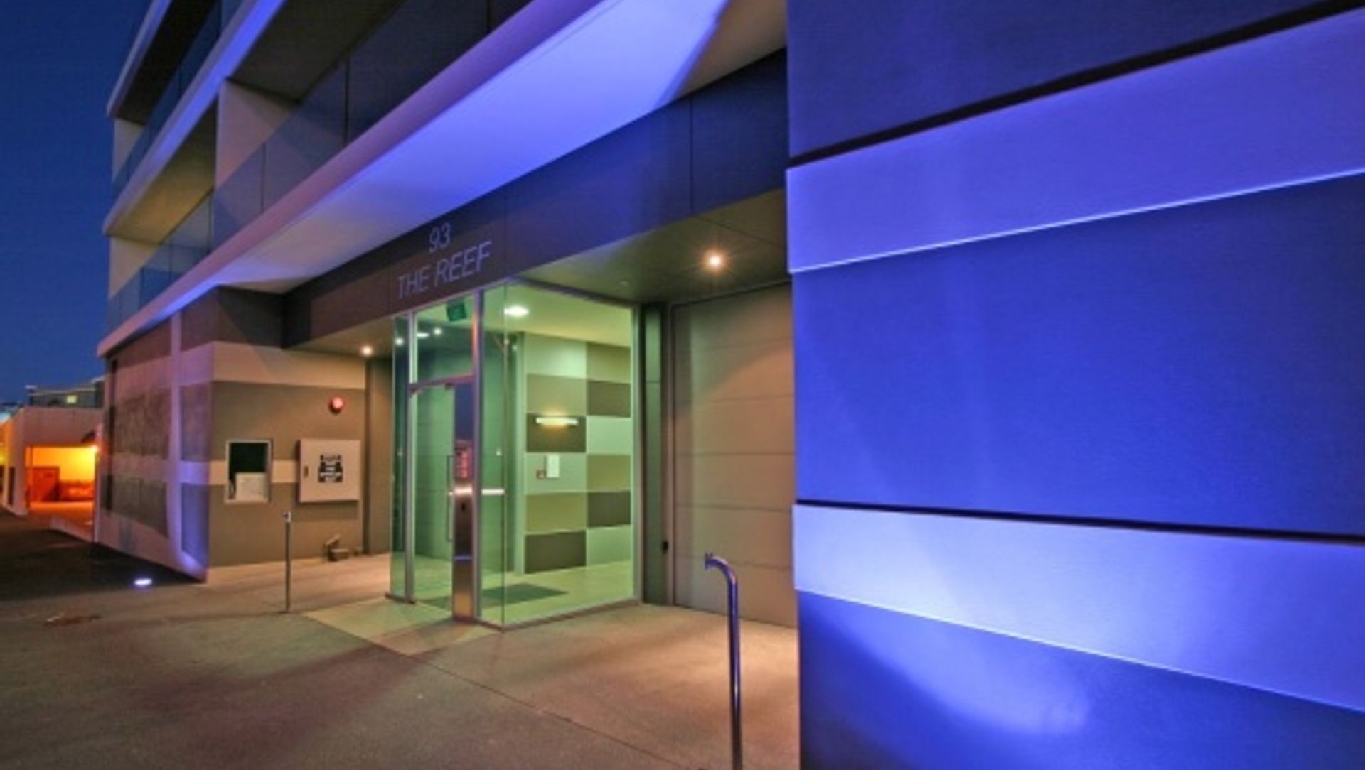 The Reef Apartments banner