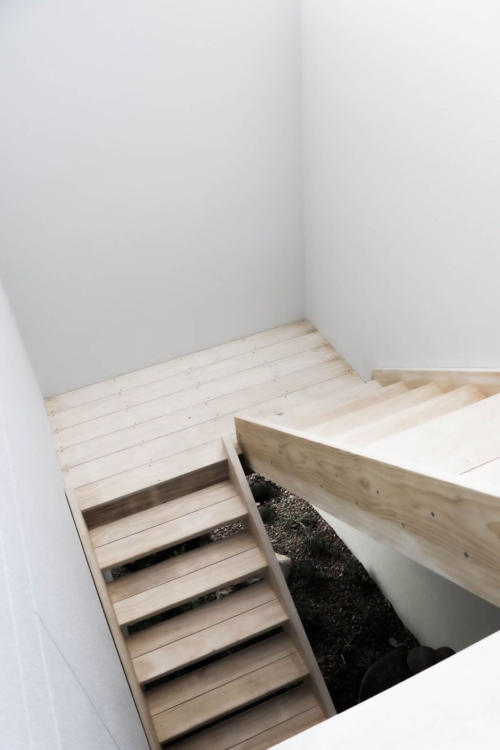 Anderson Residence - Staircase. Folded timber stair landing.