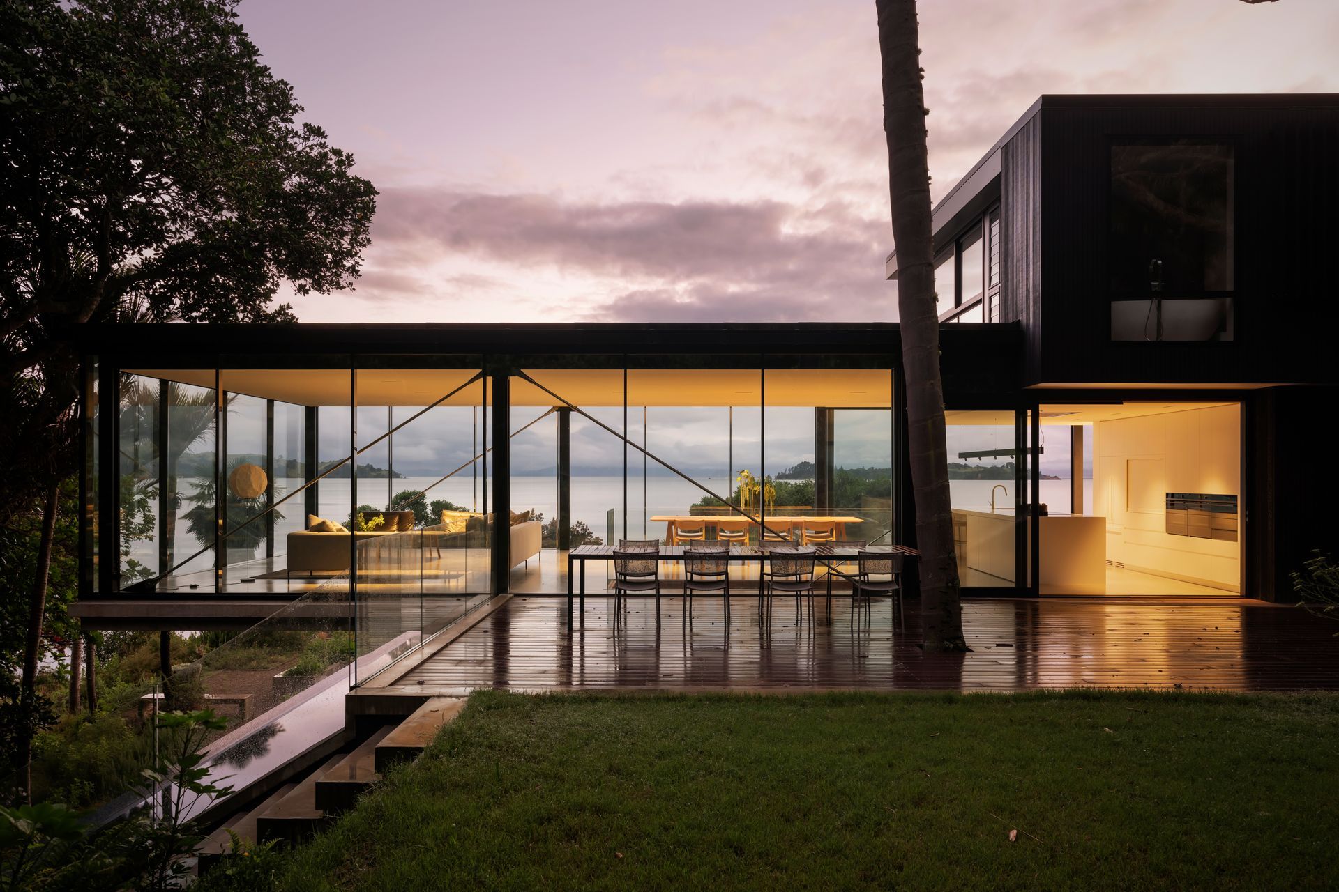 Open outdoor living leading towards the deck and the interior connection to its seaside surroundings.