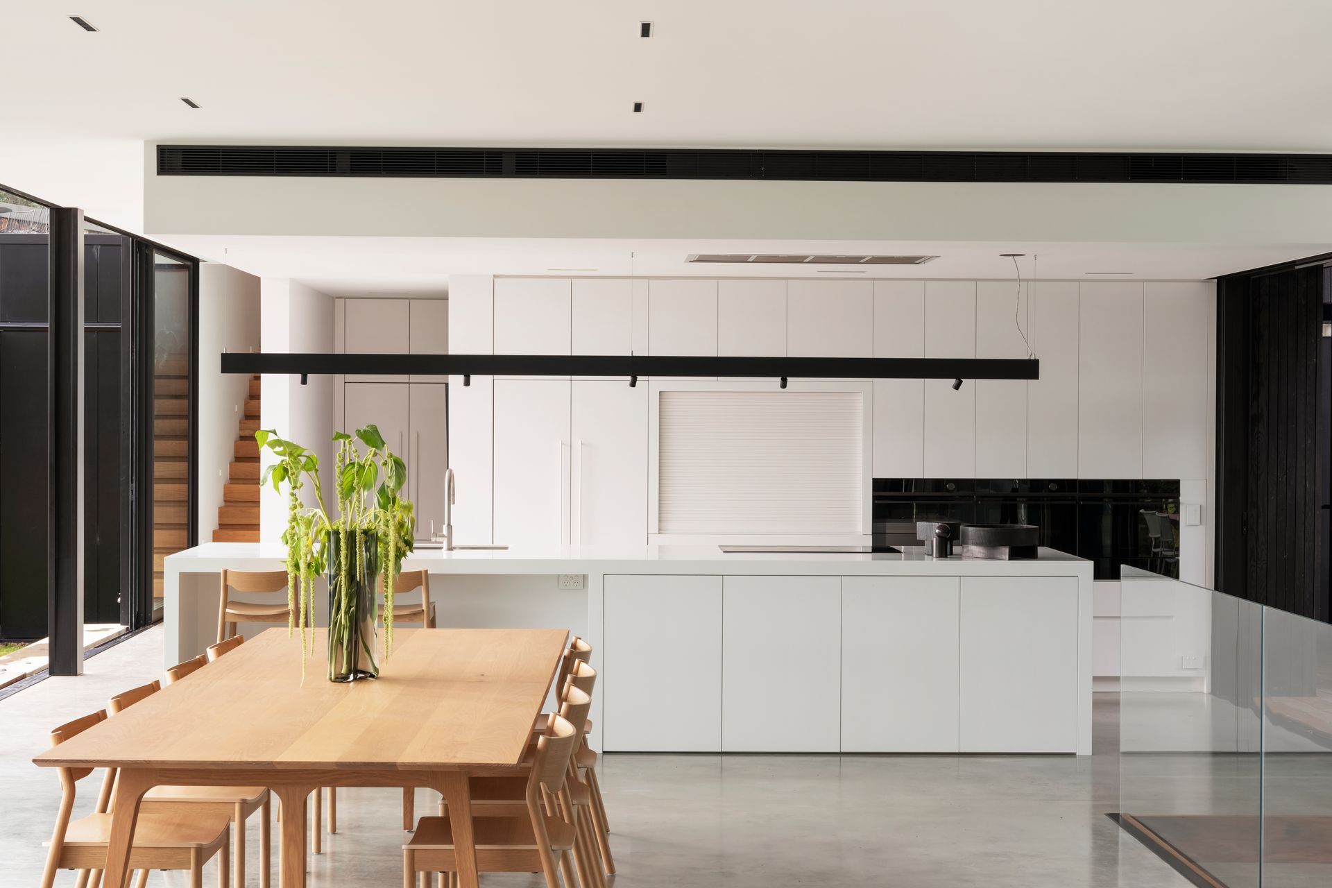 The collaboration between modern and natural lifestyle designed throughout the open plan of kitchen, living and dining.