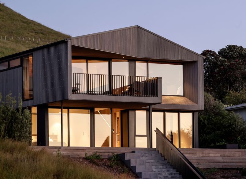 A richly textured beach home with views from hill to horizon