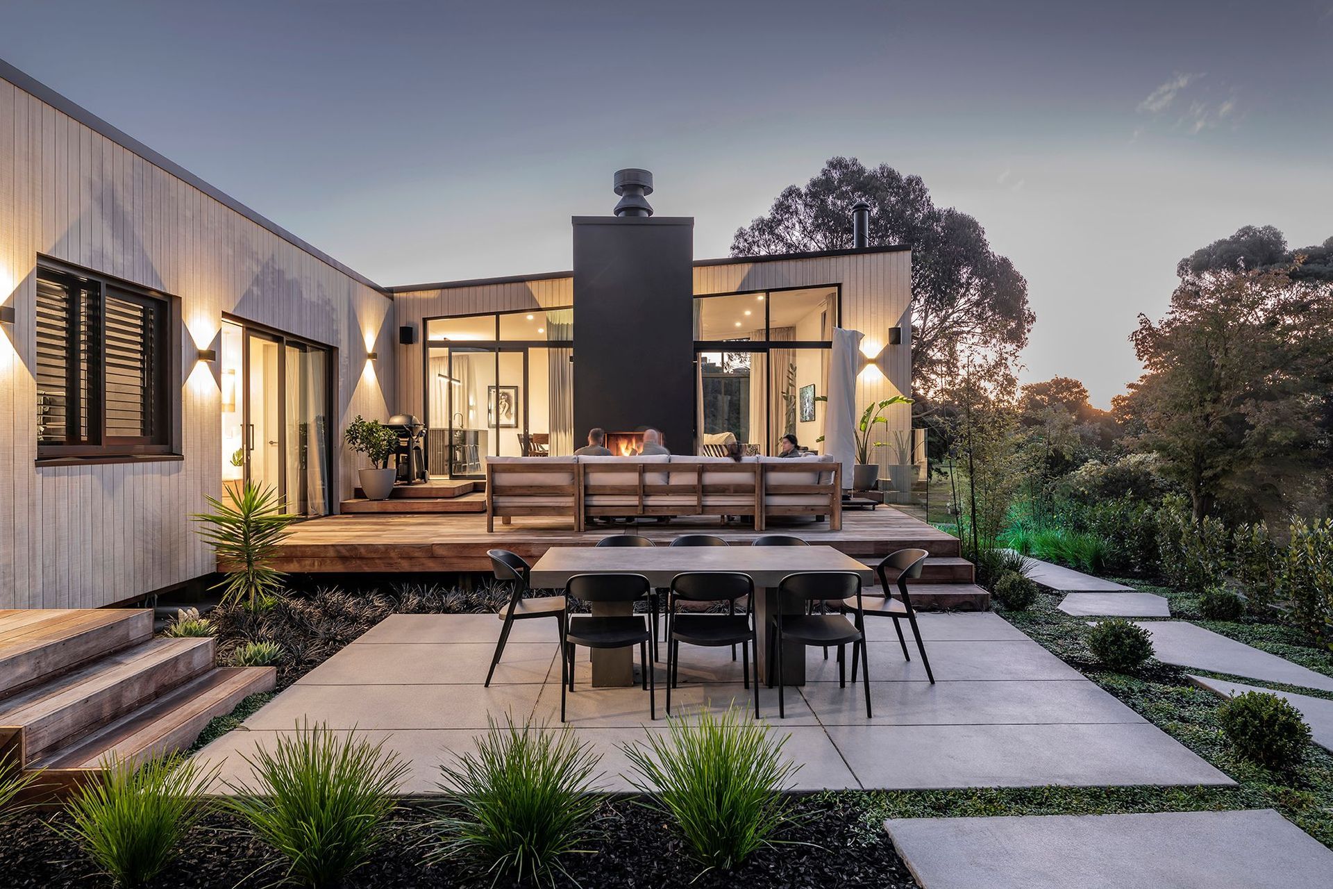 The outdoor living area connects seamlessly to the internal living spaces while connecting the occupants privately to the coastal setting