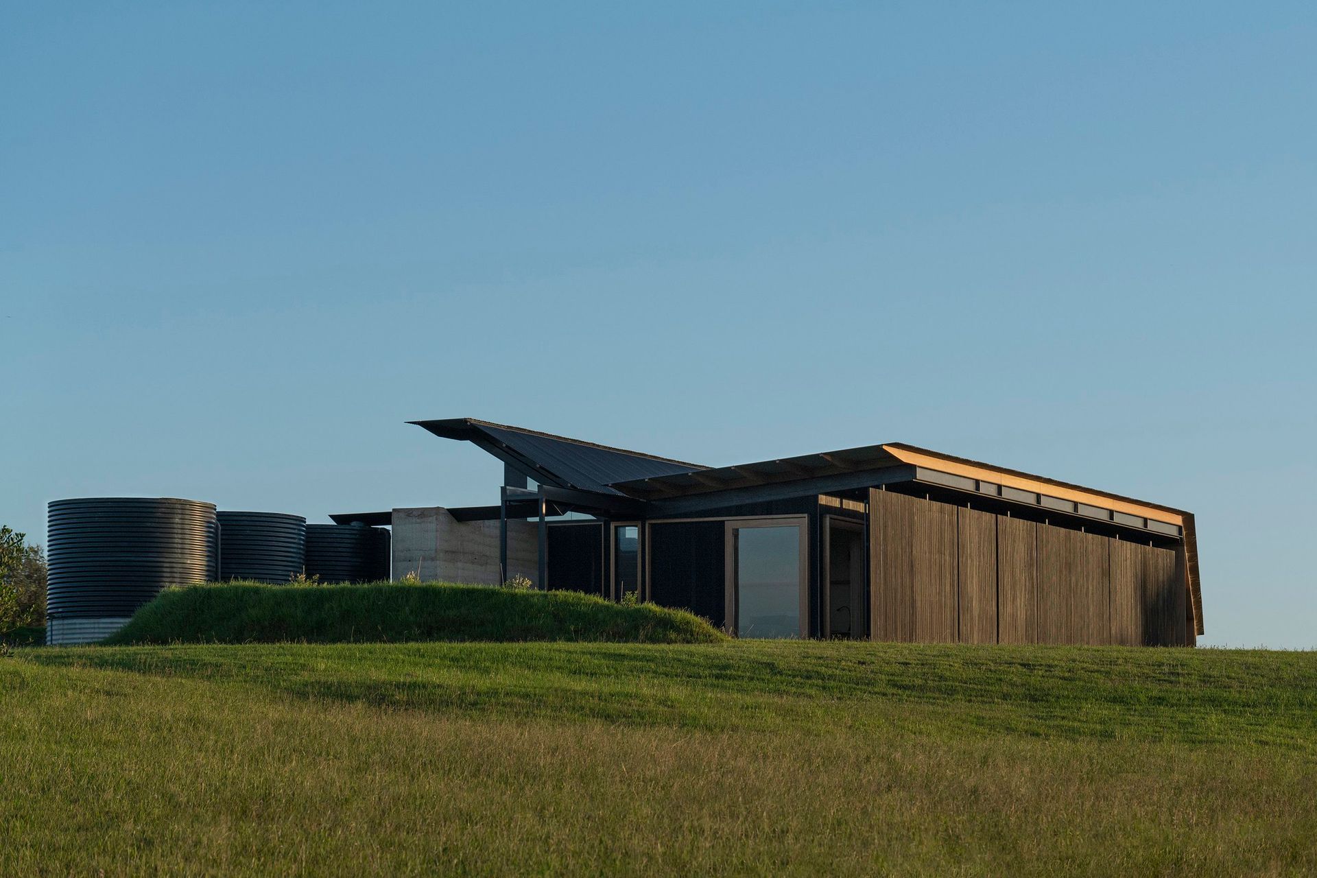 The picturesque Mystery Bay House is off-grid: generating all power and collecting all water on site.