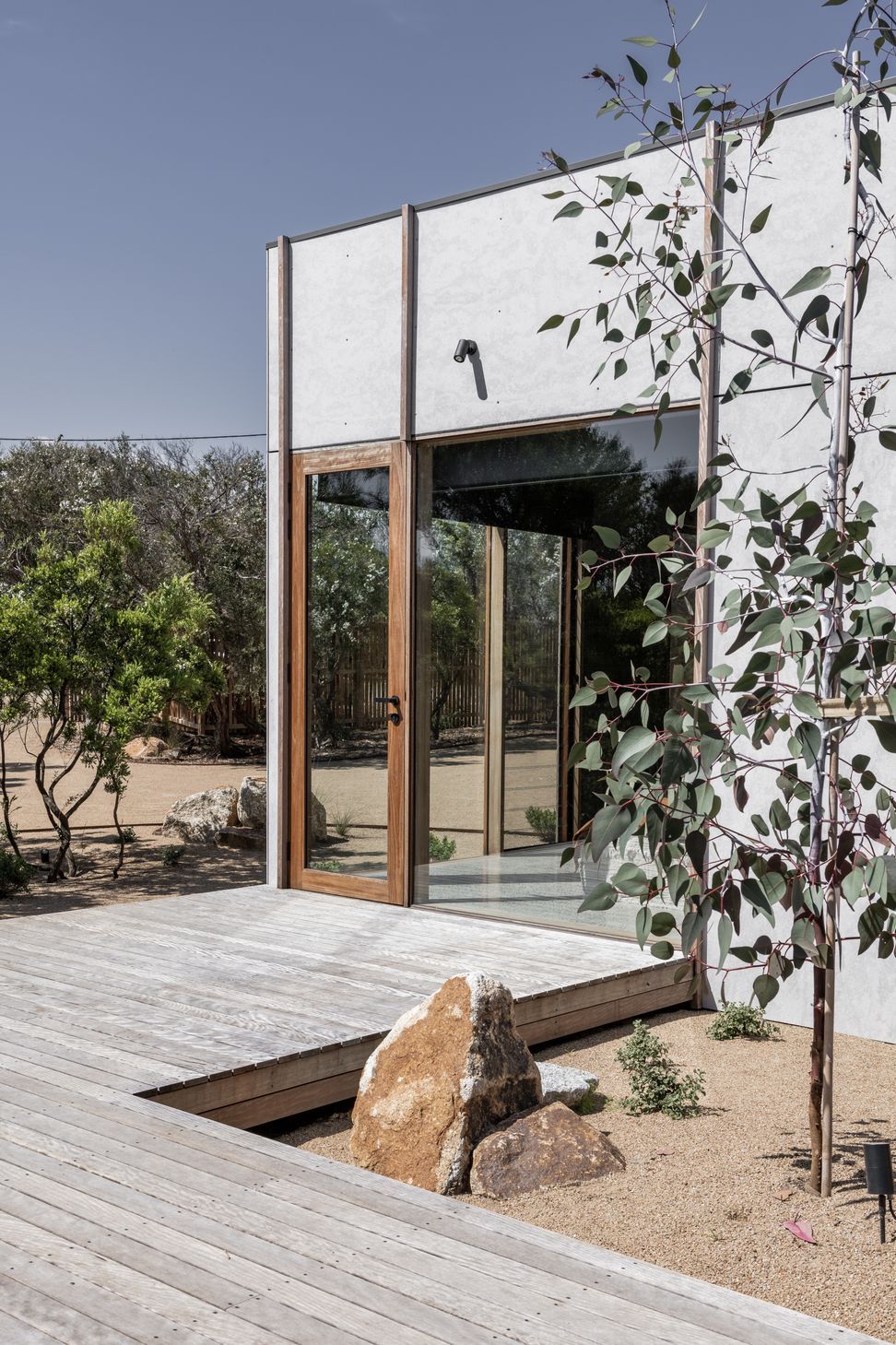 Darwin Stringybark bushfire-resistant timber creates a private deck outside the master bedroom
