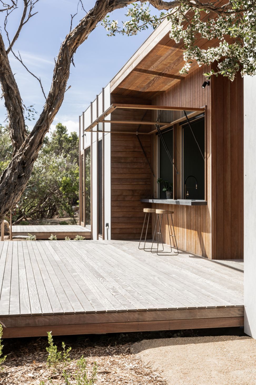 Large awning windows allow walls to open up and shut down to suit ever-changing coastal weather