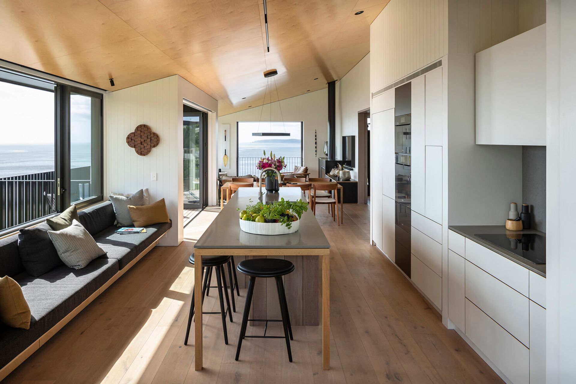 Running roughly north-south, the open-plan living area is bathed in natural light and enjoys ample cross ventilation thanks to the split cruciform design of the building.