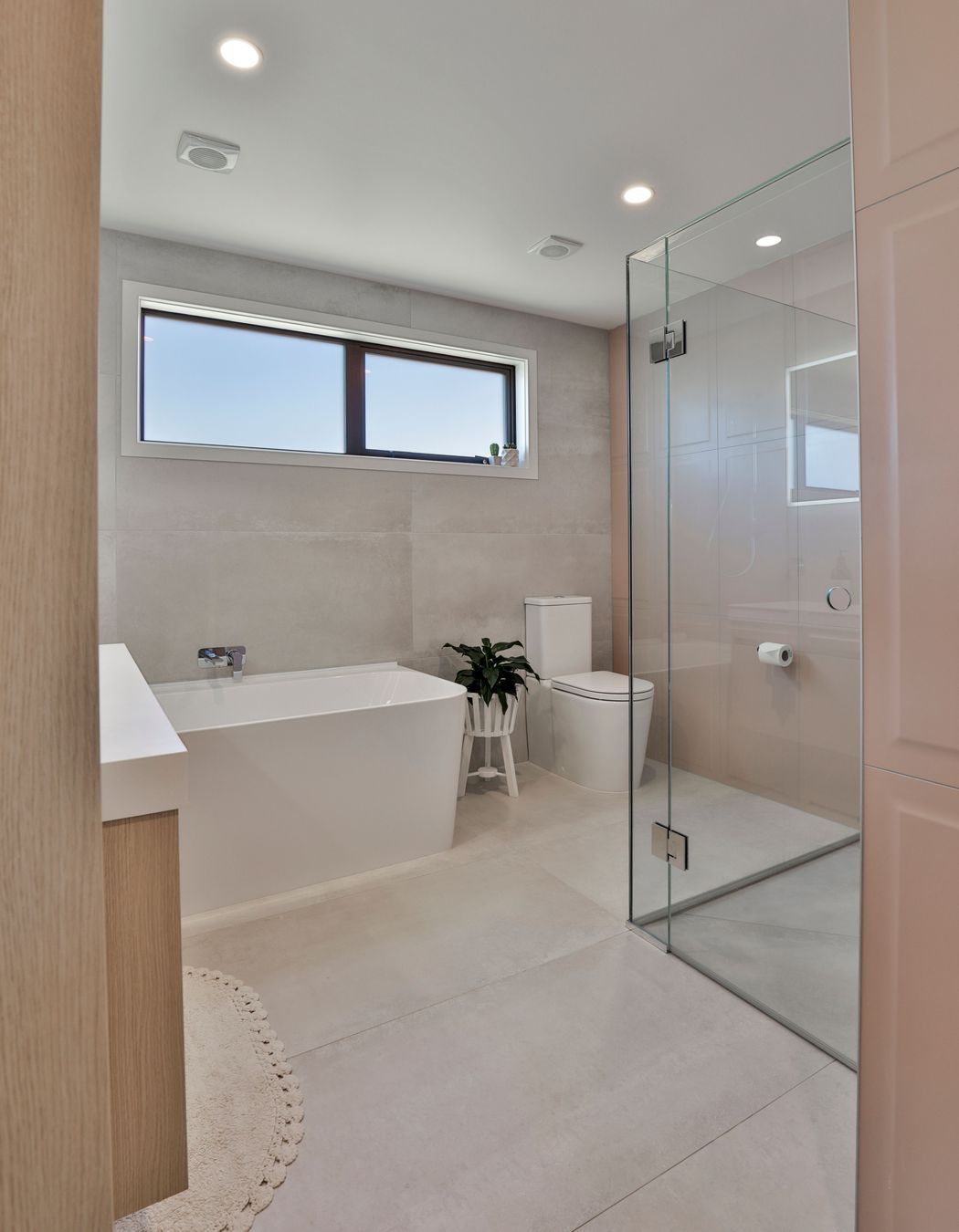 Bathroom: Ensuite: Ferrocemento Bianco 597x1196mm and Victoria Blush Smooth Panel 400x800mm