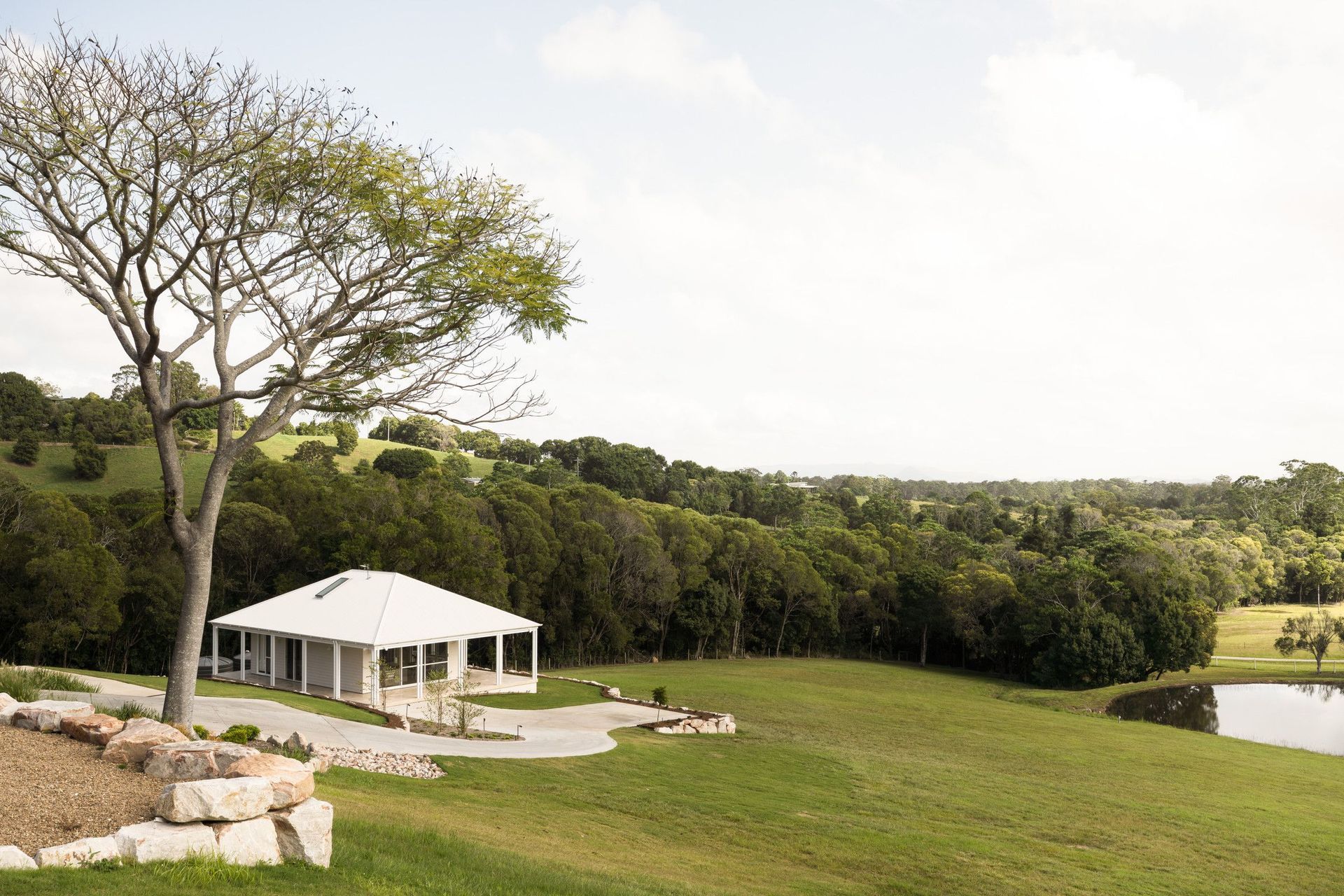 Euroa Farm - Garden. Pavilion and dam set within the rolling hinterland landscape.