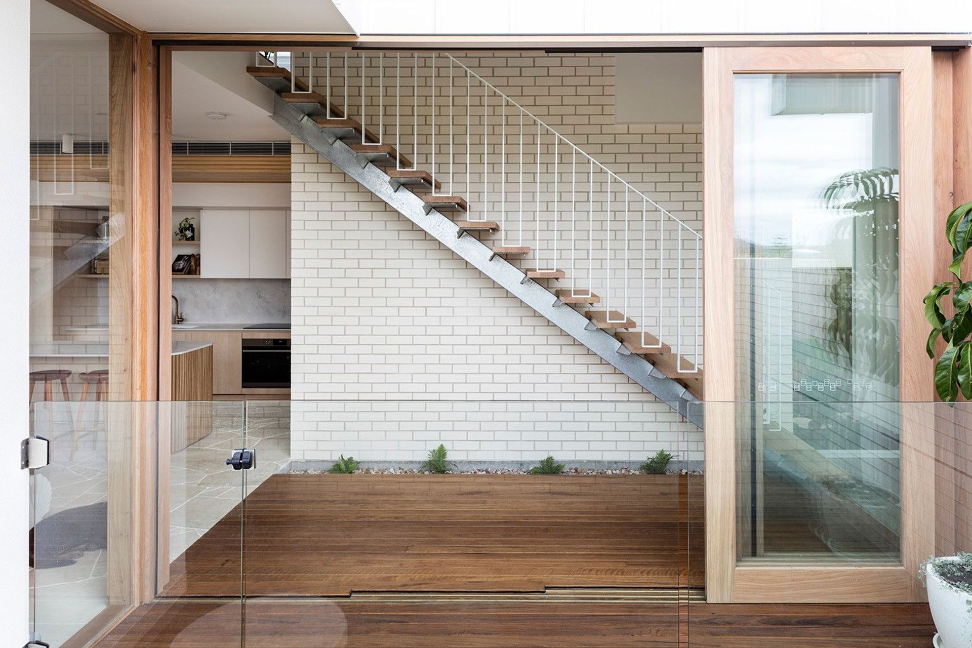 Viner Residence - Staircase. Floating stair above an internal courtyard.