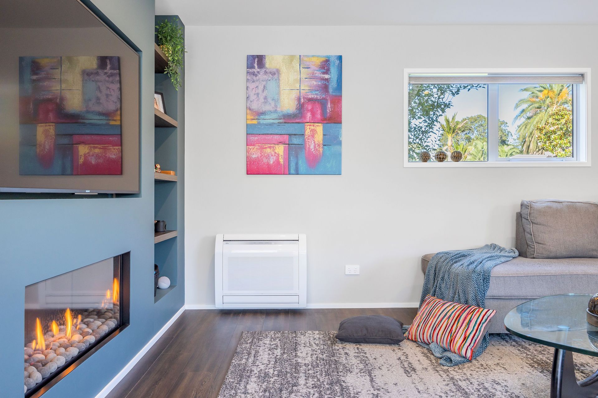 This Living Rooms is designed to be comfortable and cozy, providing a space for relaxation and unwinding. It is the space where the client's showcased their individuality through decor, and artwork.