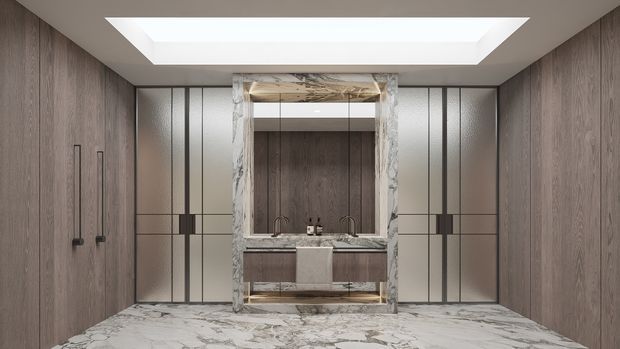 A symmetrical, luxurious bathroom vanity viewed straight on. The room features full-height dark wood wall panelling, large pale marble floor and vanity surfaces, fluted or textured metallic wall panels with dark vertical trim, twin wall-mounted taps and basins, and a large illuminated recessed skylight above. The central vanity is framed in veined marble with mirrored cabinetry and open shelving.