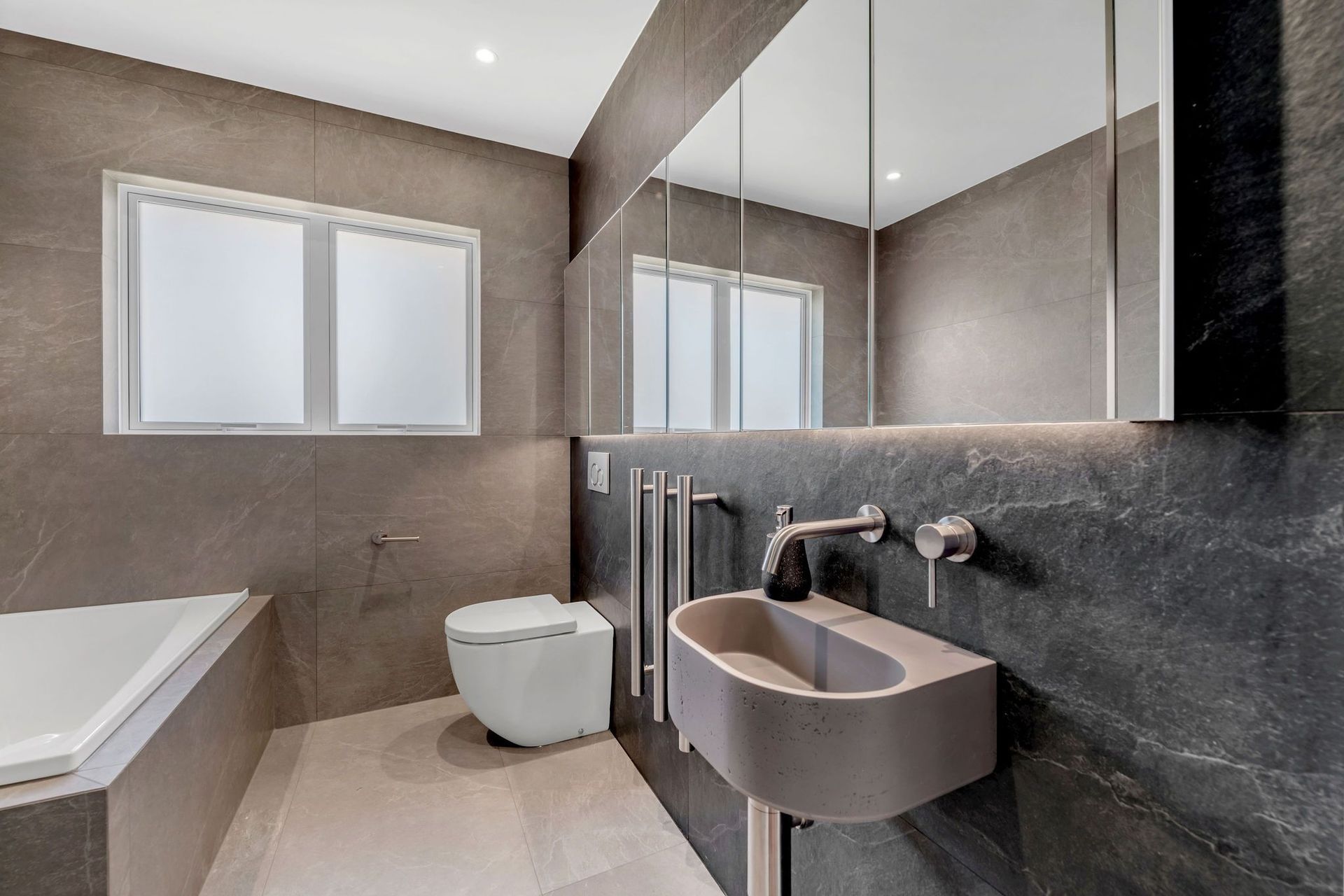 Craftsmanship matters in the small spaces, and this bathroom renovation shows just how much.