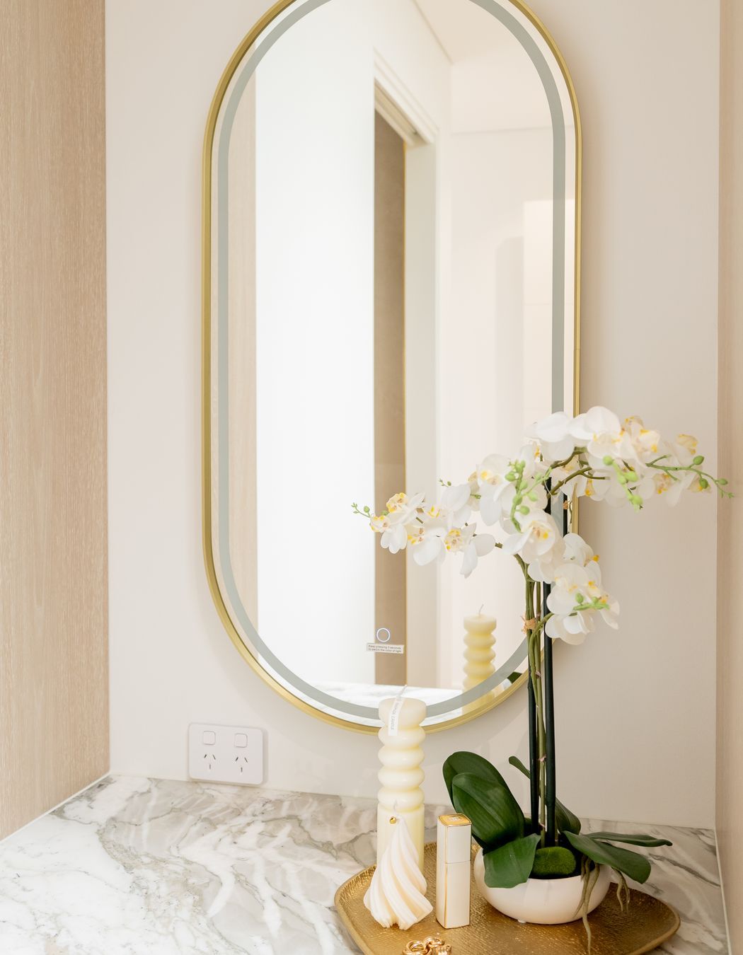 Framed LED Oval Mirror in Brushed Brass