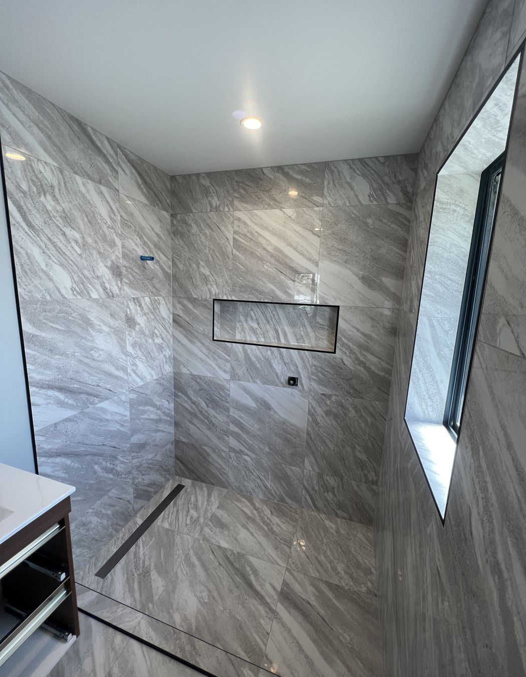 Tiled bathroom floor &amp; shower walls