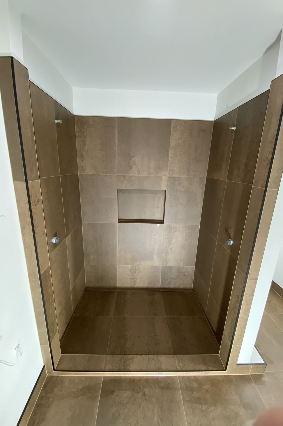 Tiled bathroom floor &amp; shower walls