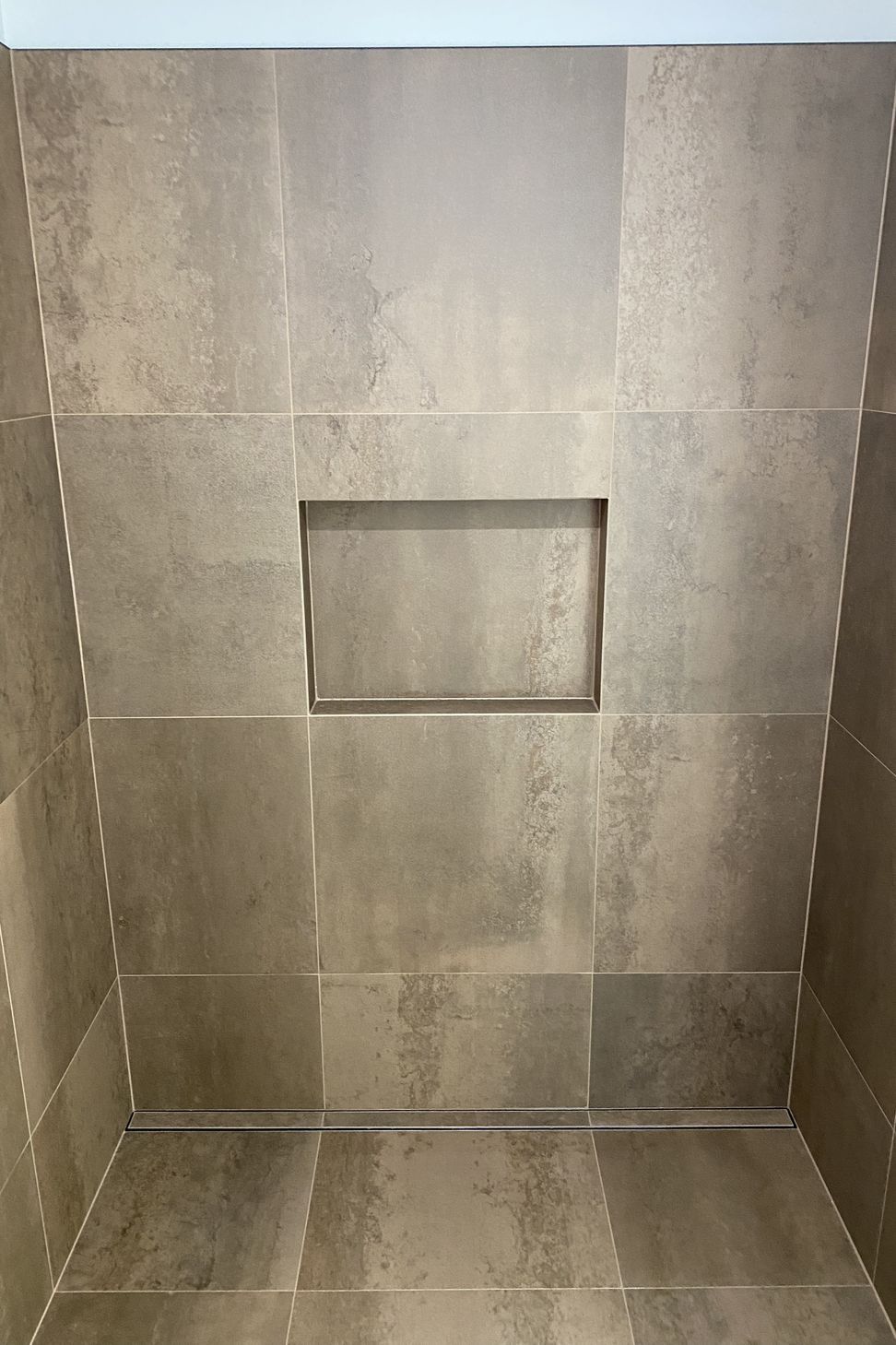 Tiled bathroom floor &amp; shower walls