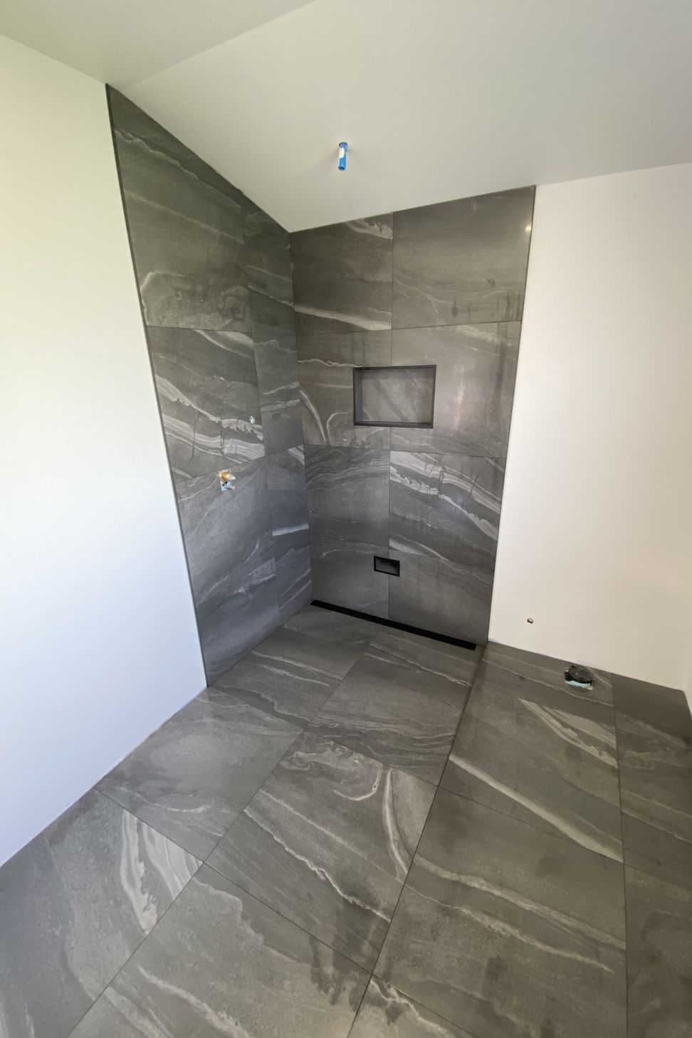 Tiled bathroom floor &amp; shower walls