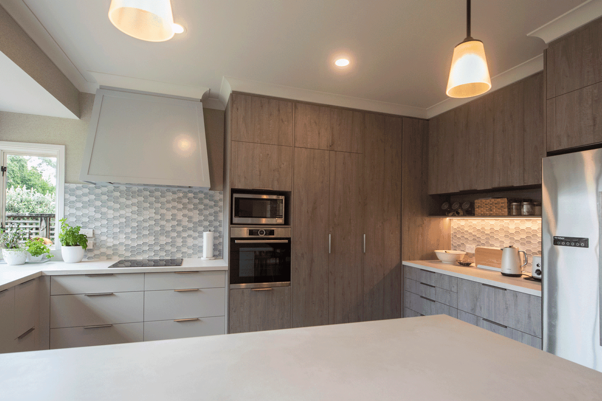 Having a separate area for snacks and drinks to be prepared helps keep people away from cooks area