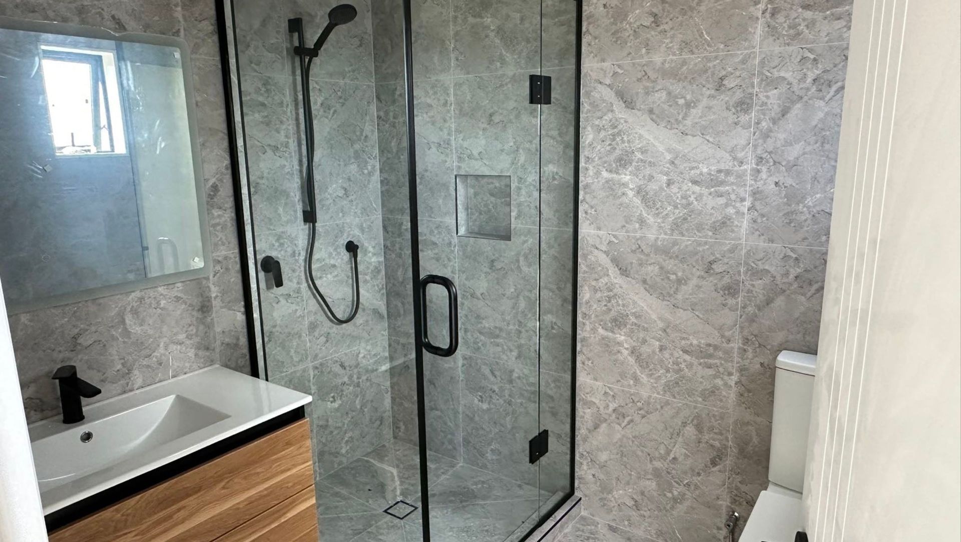 Damn Good Tiling - full tiled bathroom banner