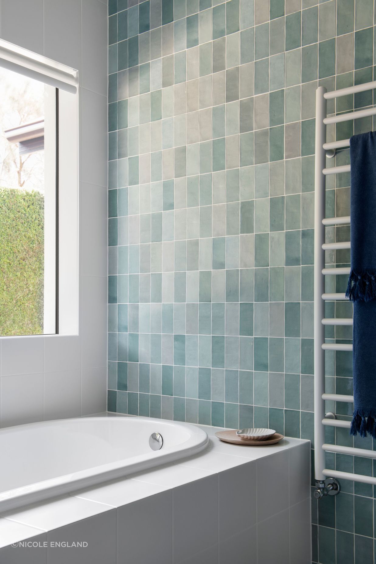 Bathroom blue / green feature tiles in matt with 5% gloss.