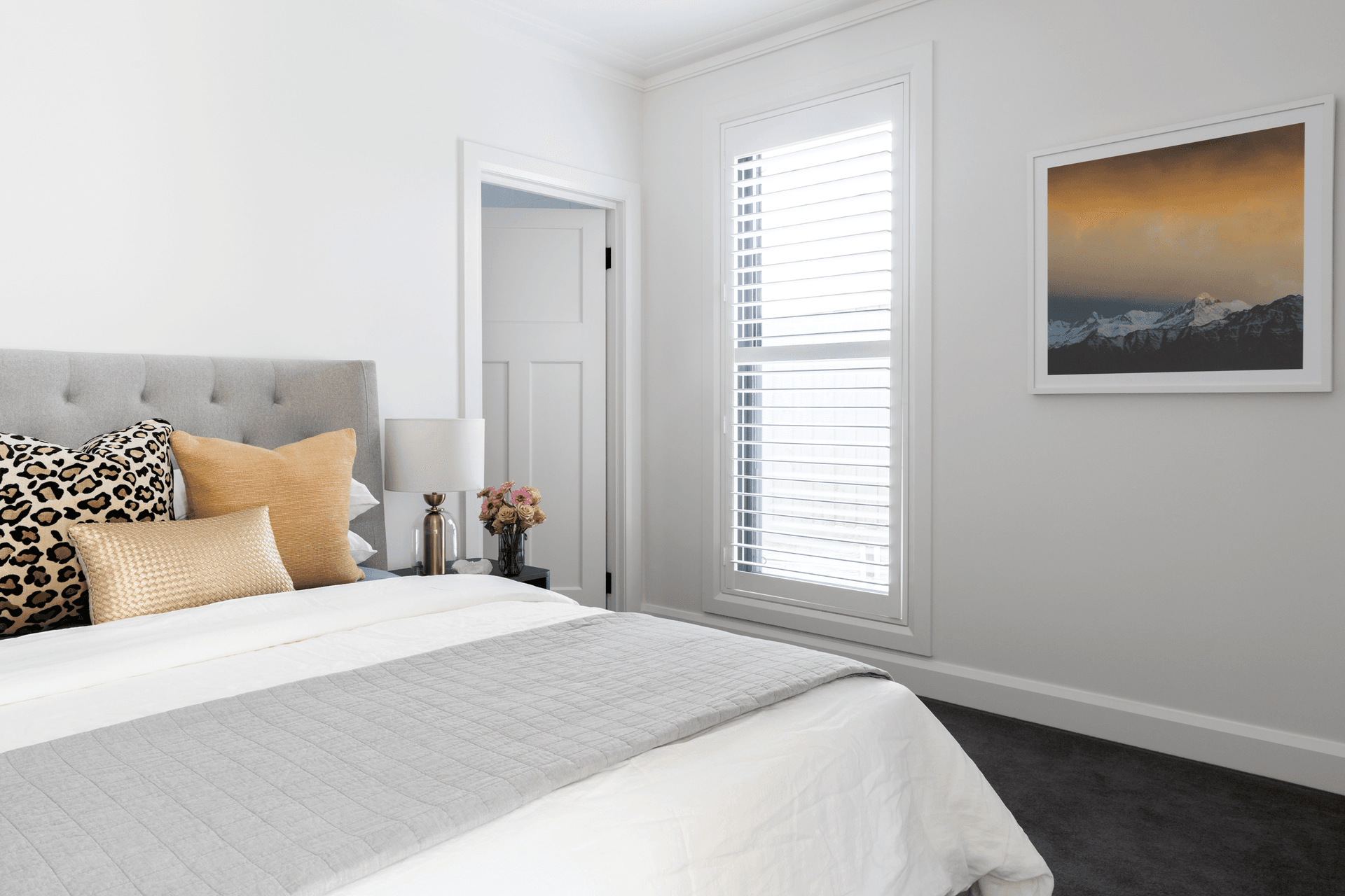 guest-room-with-gold-accents.png
