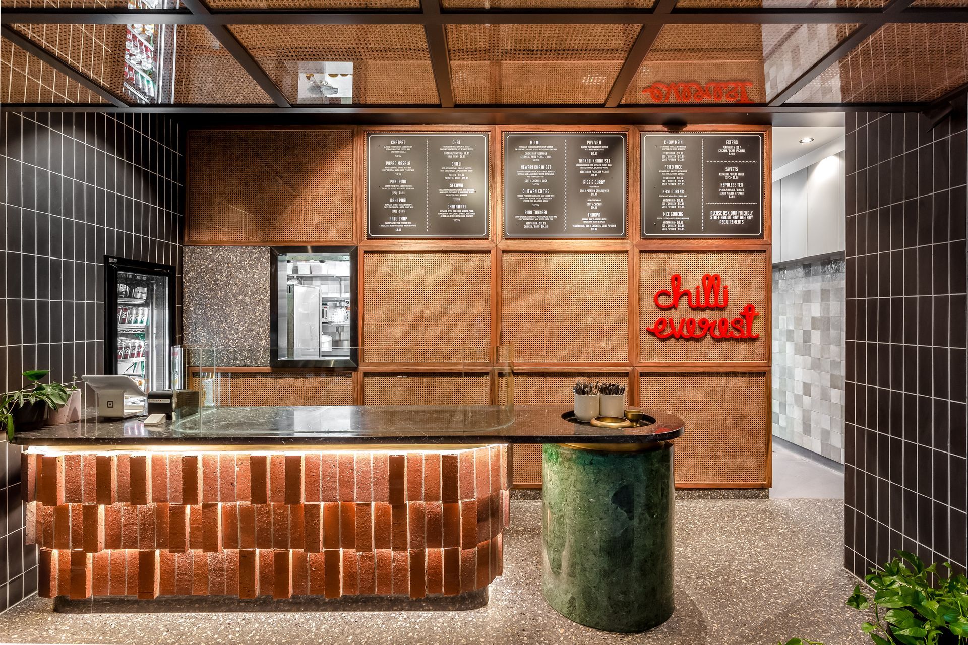 Graphite brick tiles (walls) and Rustic Red brick tiles and custom cut bricks (counter)