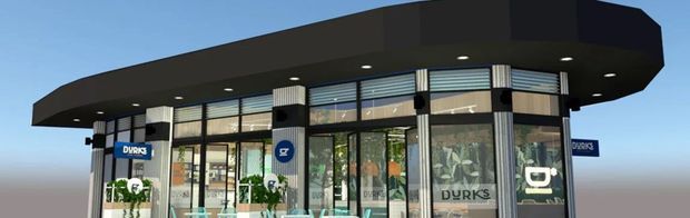 Modern commercial storefront with extensive floor-to-ceiling glazing, a dark projecting flat canopy, visible retail branding and a clean contemporary facade.