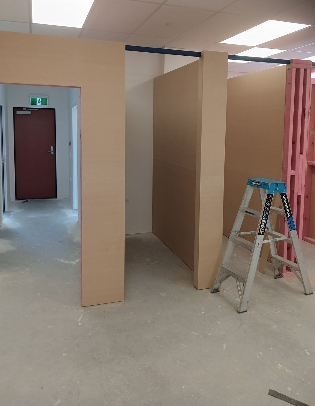 11-42-Thames-St-Oamaru-Caroline-Eve-mdf-sheeting-linings-being-installed-for-the-changing-rooms-JDBuilders.jpg