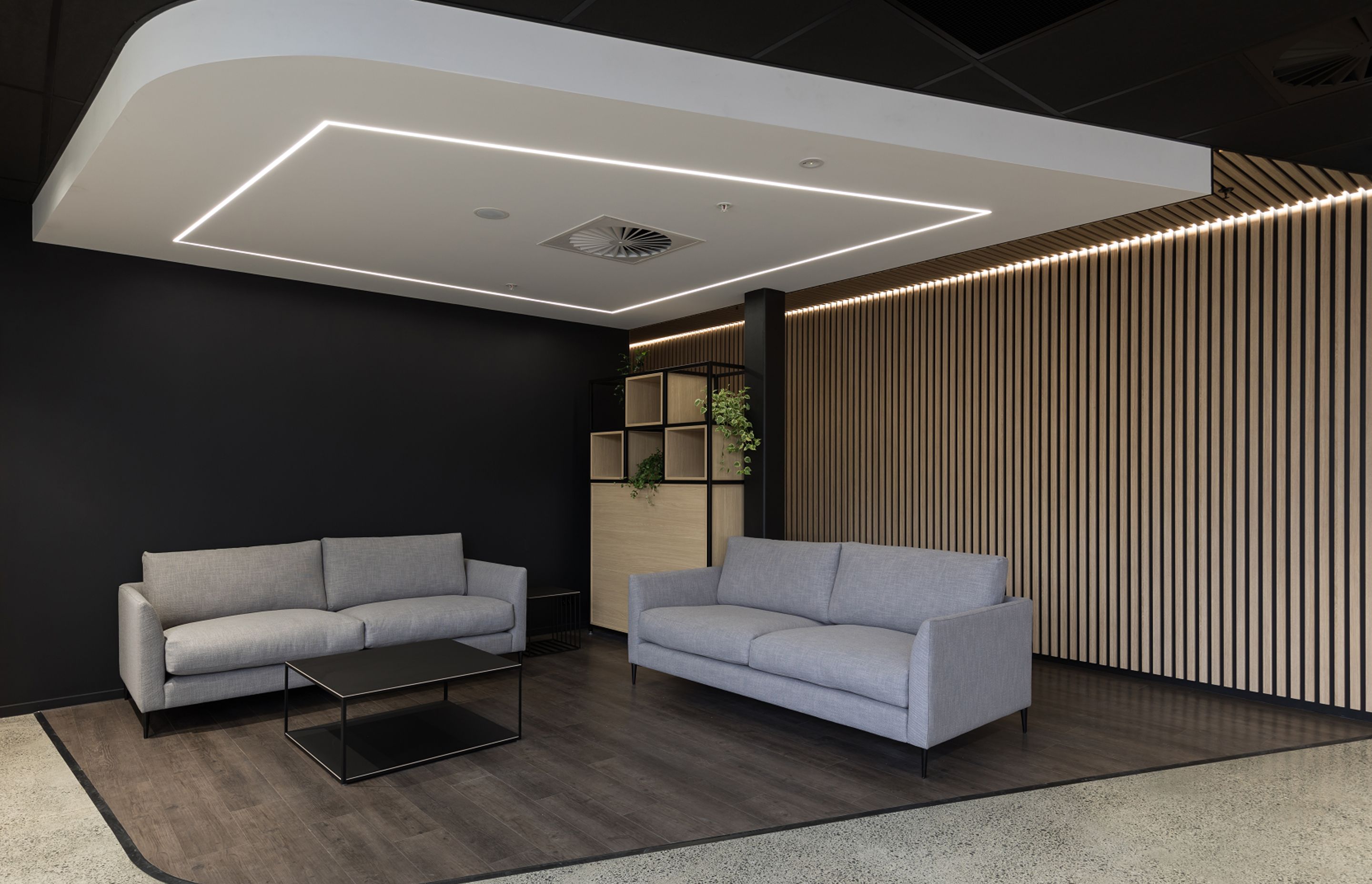 Recessed linear lighting adds drama
