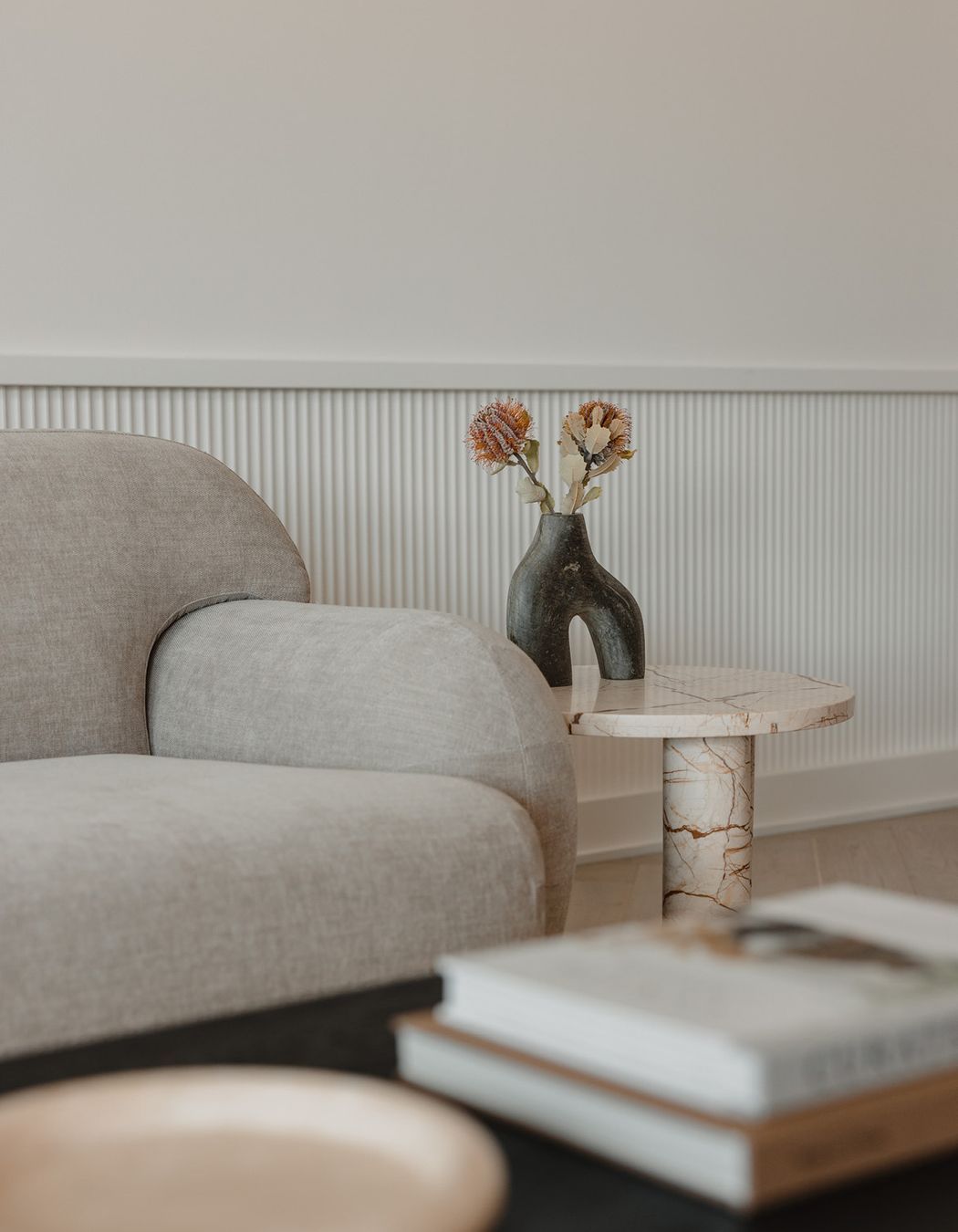 Pictured here: Sidney Plump 3 Seater Sofa and Amara Round Leg Side Table