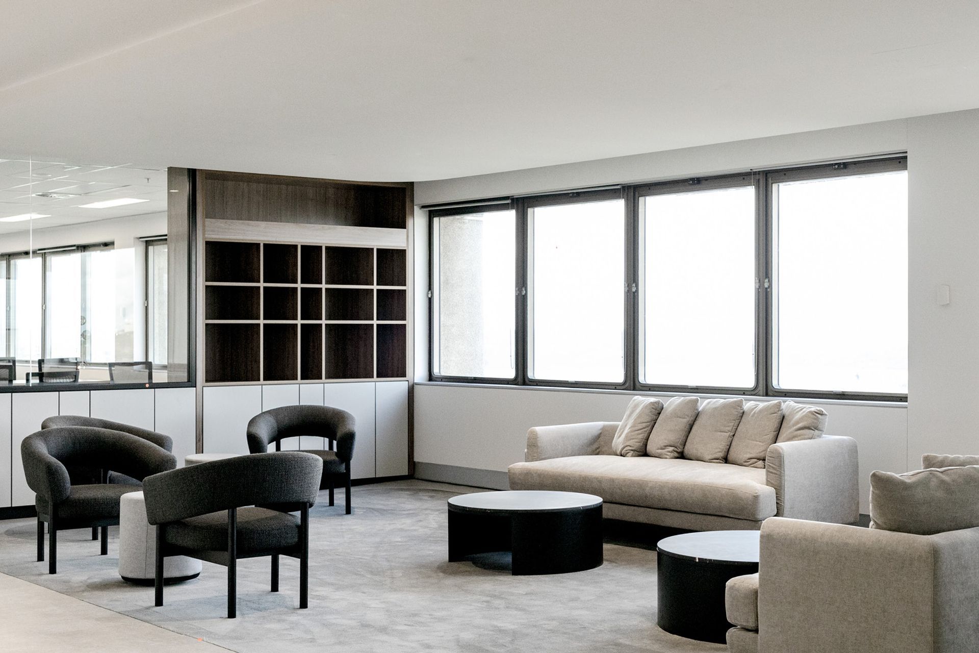 Pictured here: Jenson Occasional Chair and Oberon Crescent Marble Coffee Table