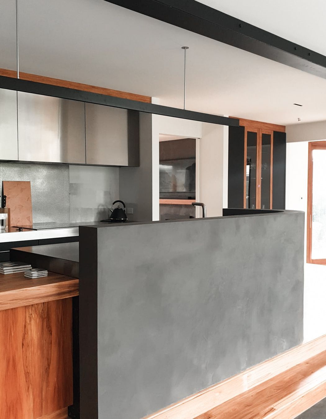 Dark polished plaster kitchen island completed by Claddagh Plastering Ltd